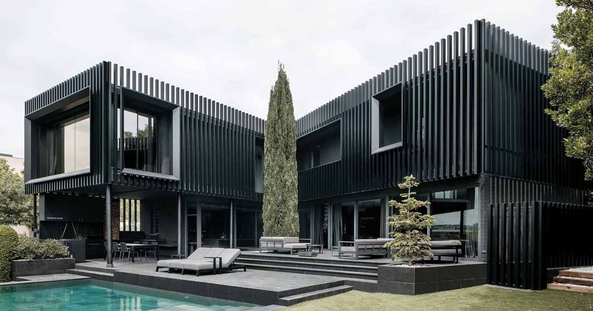 Vertical Fins Surround The Exterior Of This House Giving It A Distinct Appearance