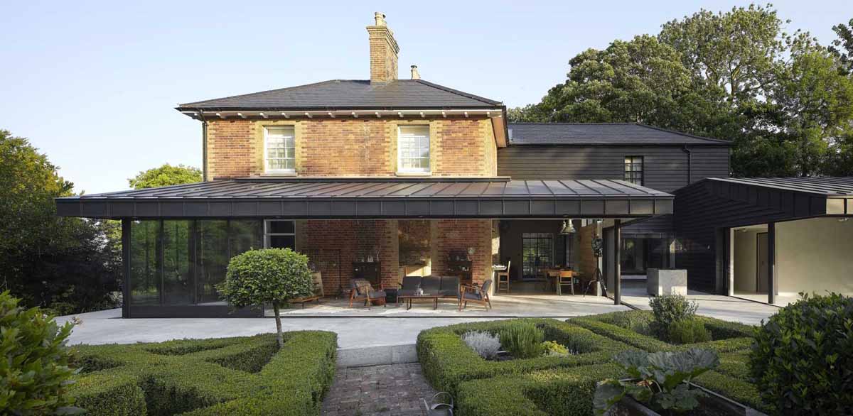 A Modern Addition For An 1830s Brick Farm House