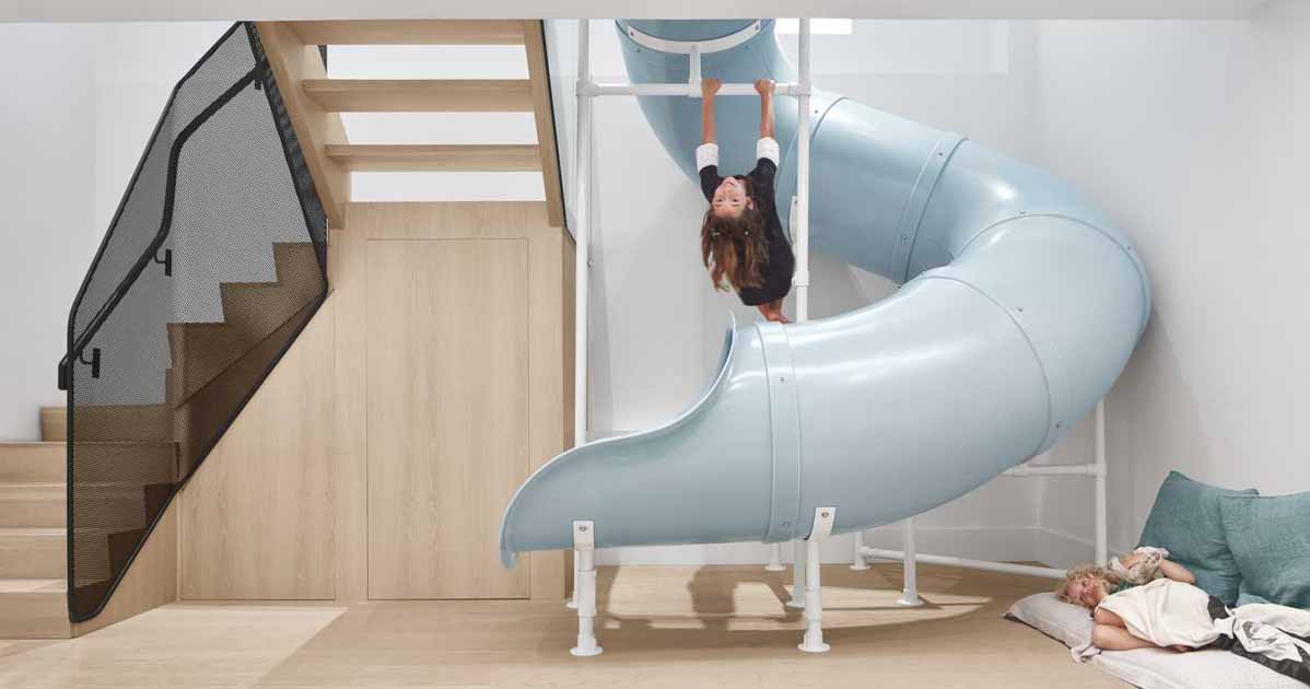 A Slide Connects The Main Floor With The Kids Bedrooms On The Lower Floor Of This Home