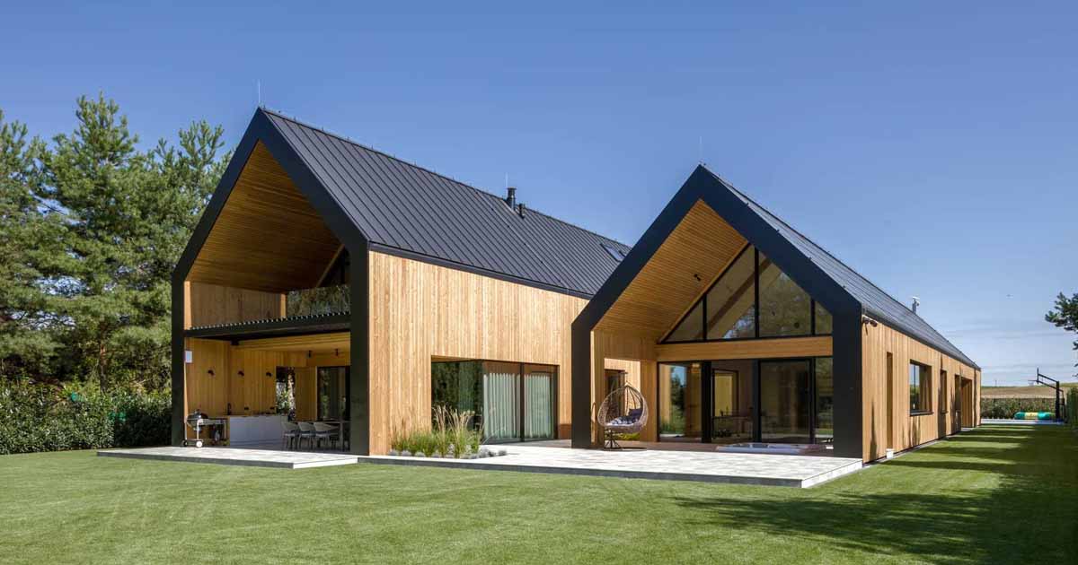 A House Designed Like Two Barns Beside Each Other