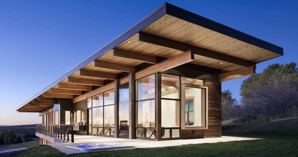 Exterior Lighting Shows Off The Post And Beam Structure Of This Home