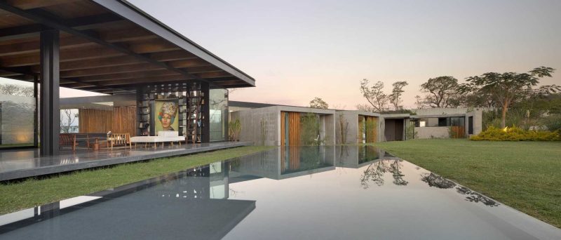 The Exposed Wood Ceiling Of This Home Shows Off Its Structure