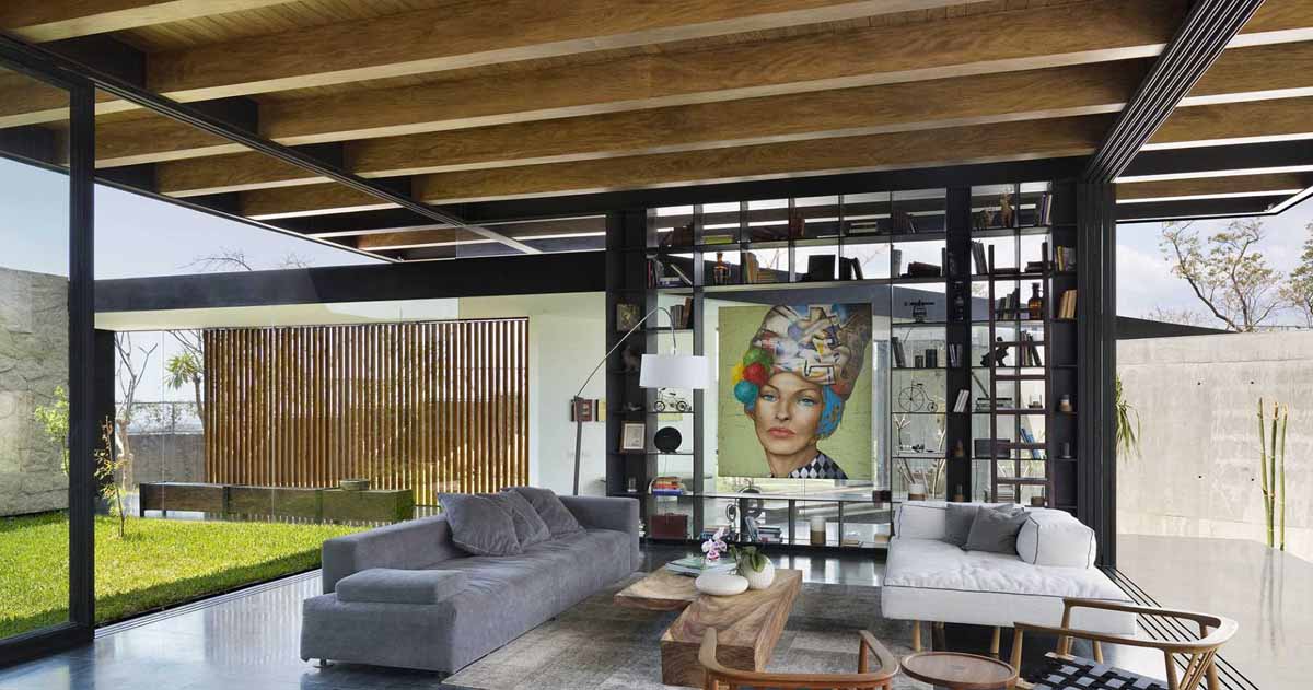 The Exposed Wood Ceiling Of This Home Shows Off Its Structure