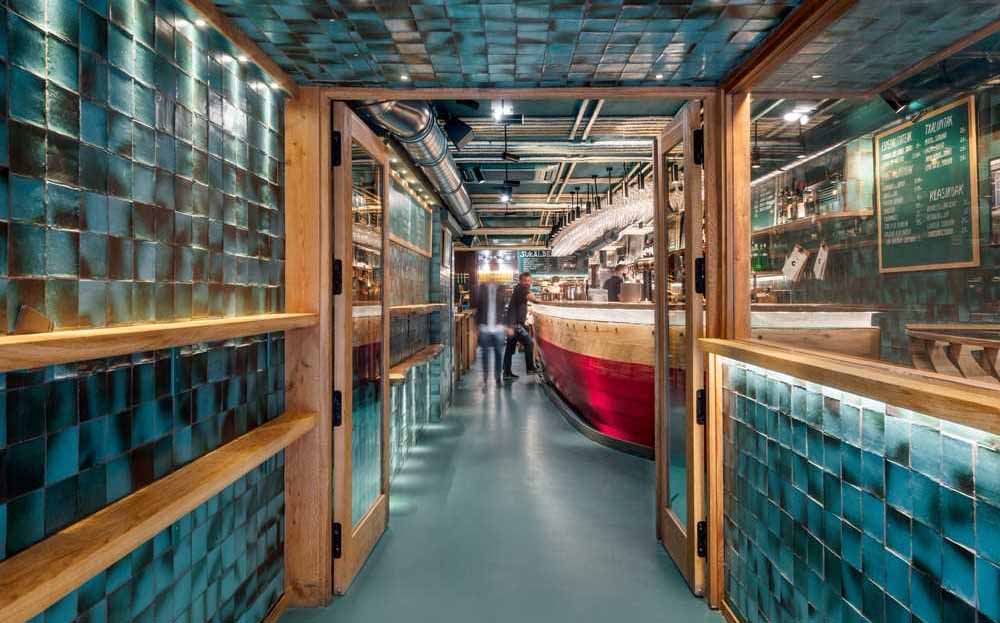 Handmade Turquoise Tiles Line The Entrance To This Spanish Restaurant