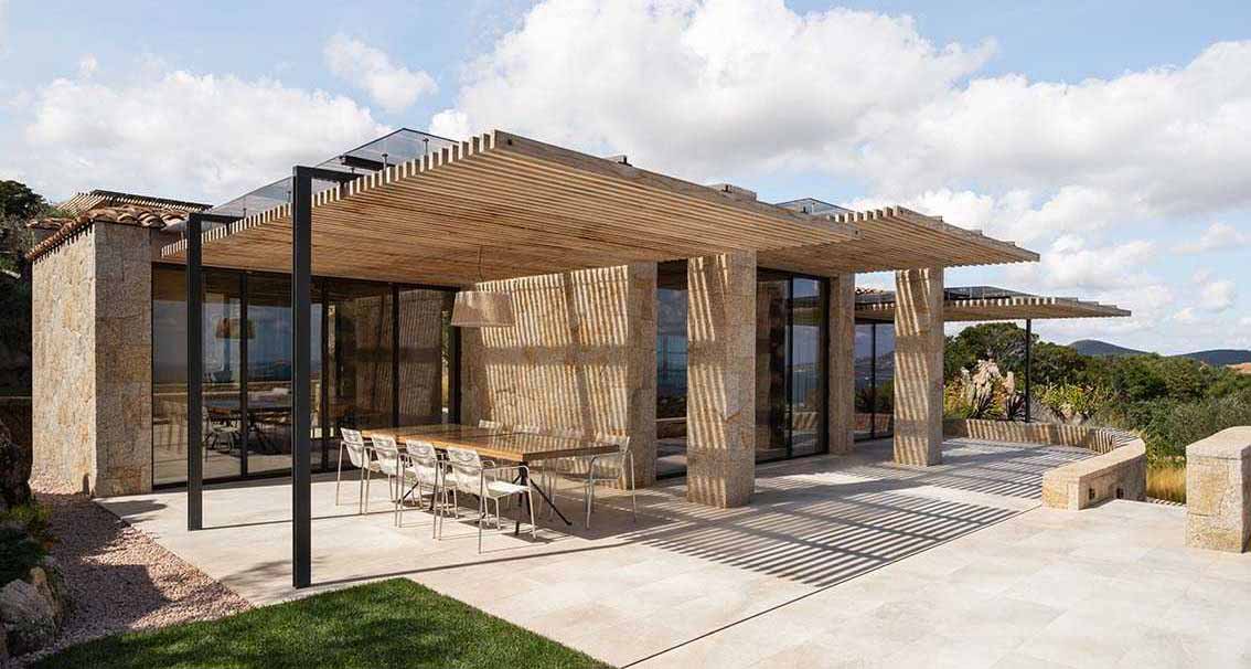 Yellow Granite Is On Display Throughout This Contemporary Home In Sardinia