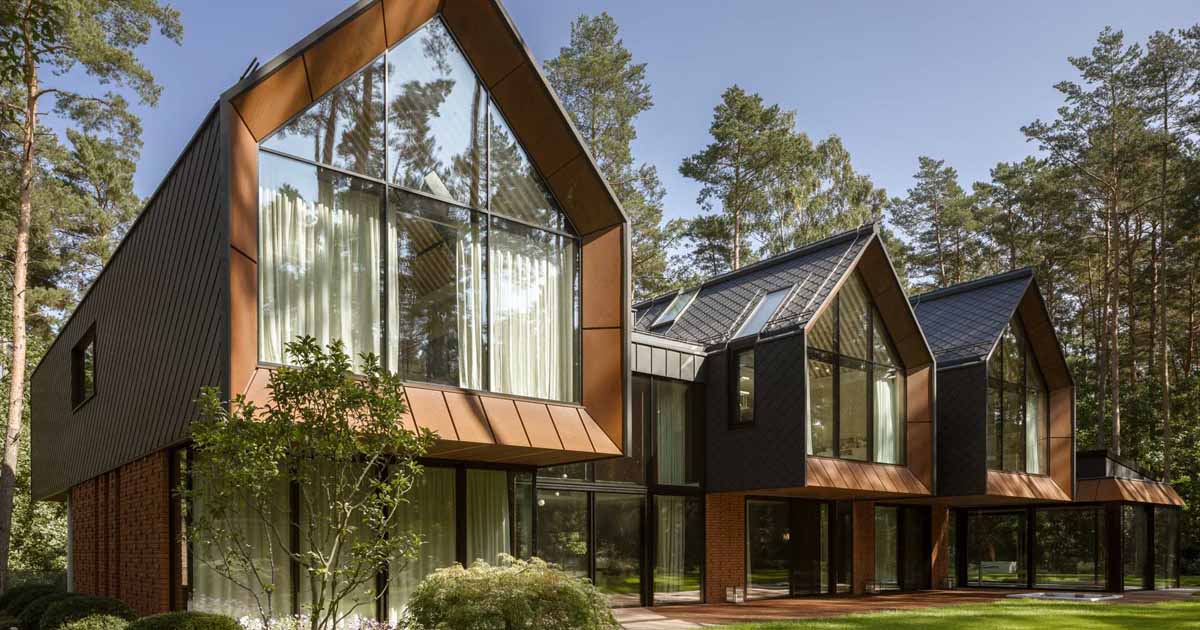 Elevated Elegance: A Unique Home In The Forest With A Trio Of Tile-Clad Gables