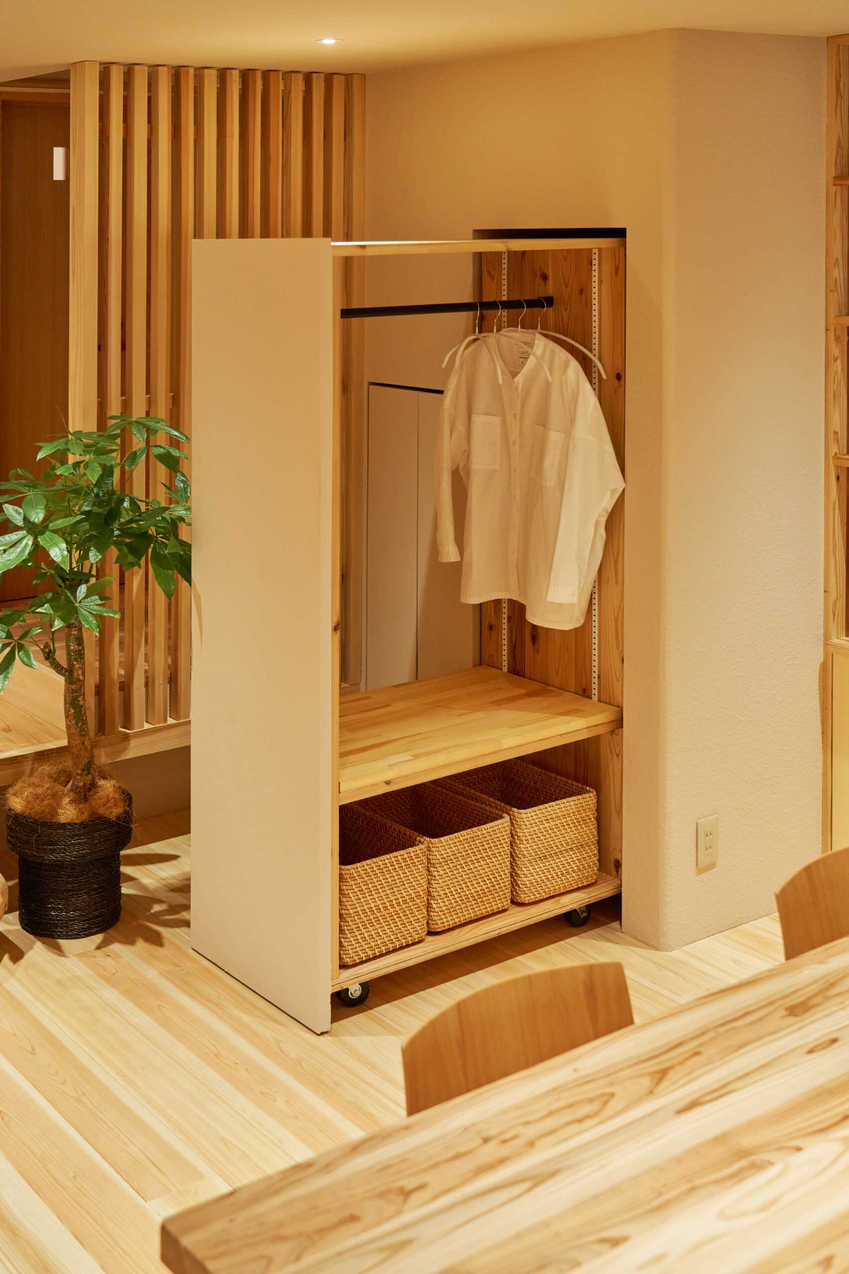 A hidden closet that can be wheeled out.