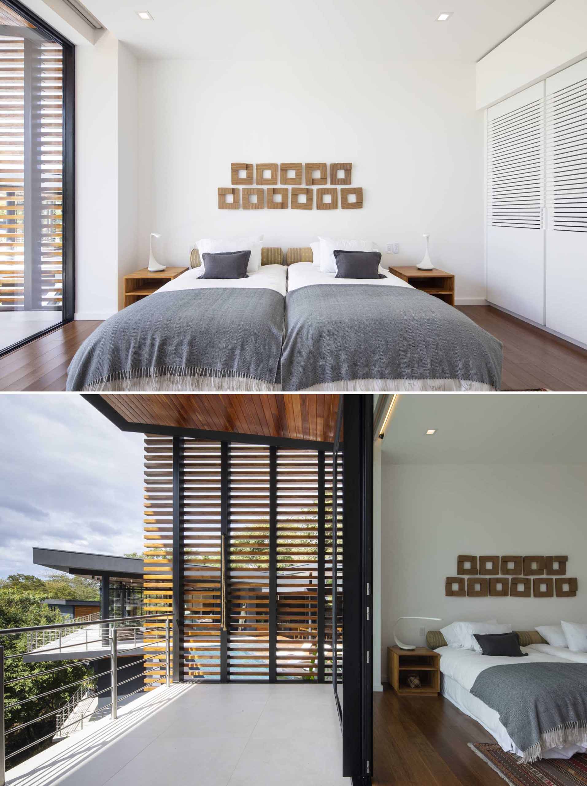 A contemporary bedroom with wood floors and access to a balcony.