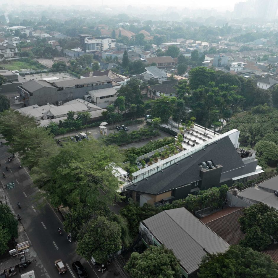 This Building With A Split Roof Makes Space For A Rooftop Park