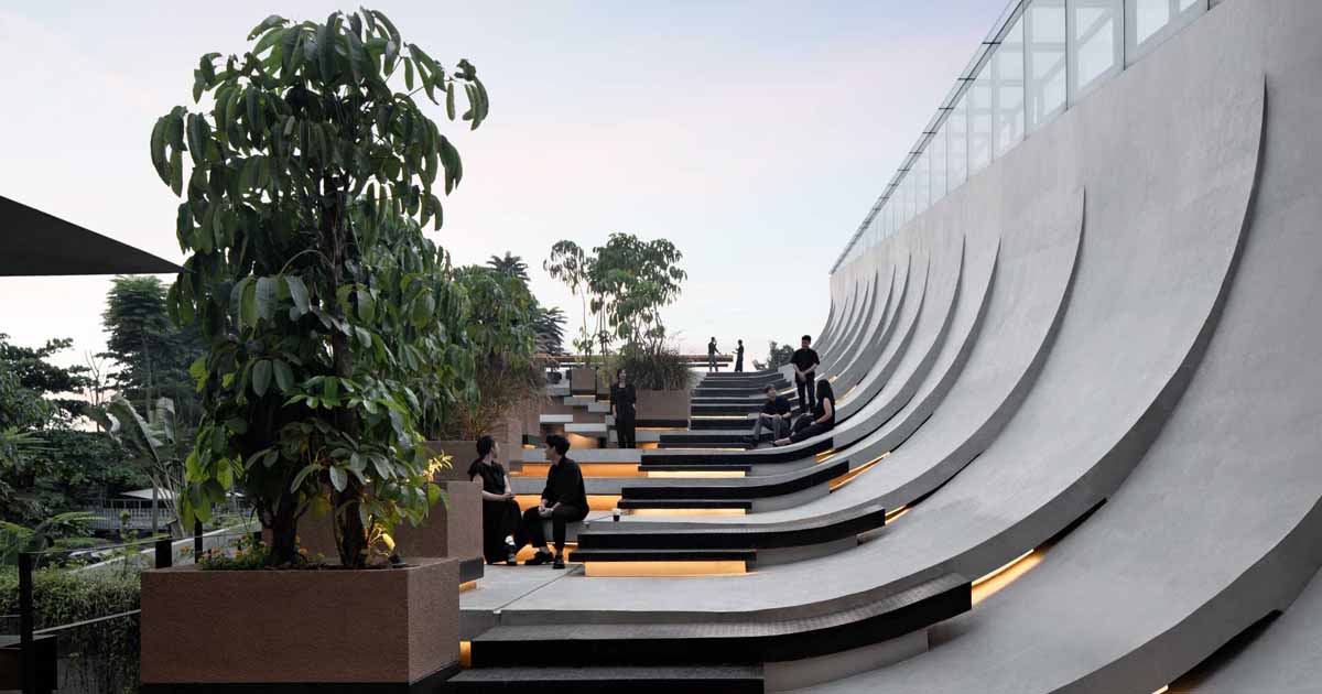 This Building With A Split Roof Makes Space For A Rooftop Park