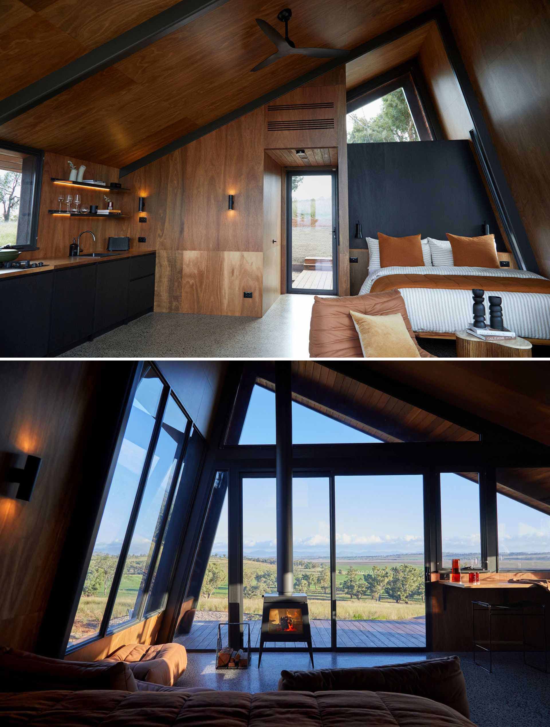 The interior of this small modern cabin is largely open-plan, with a sleeping ،e within the main living area.