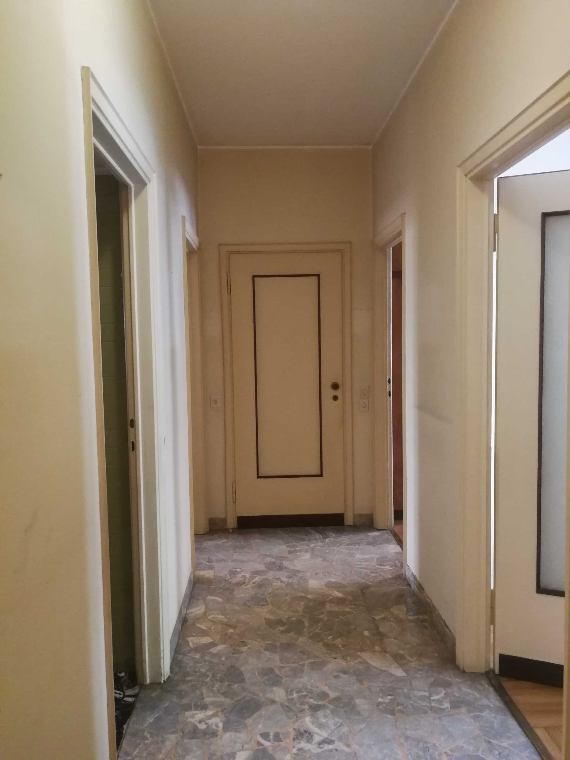Before photos of a renovated apartment.