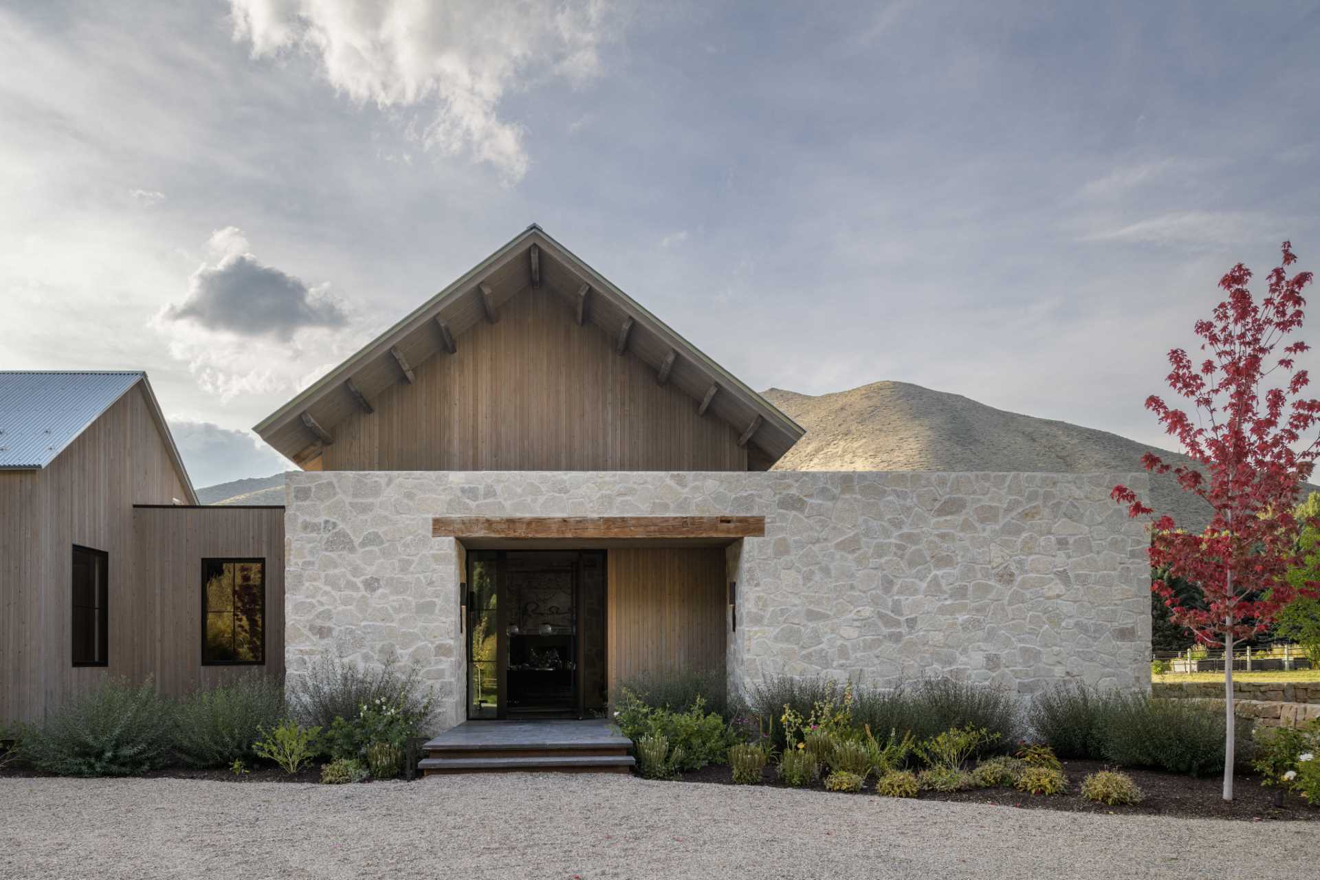 A ranch house that seamlessly integrates rustic charm and contemporary elegance.