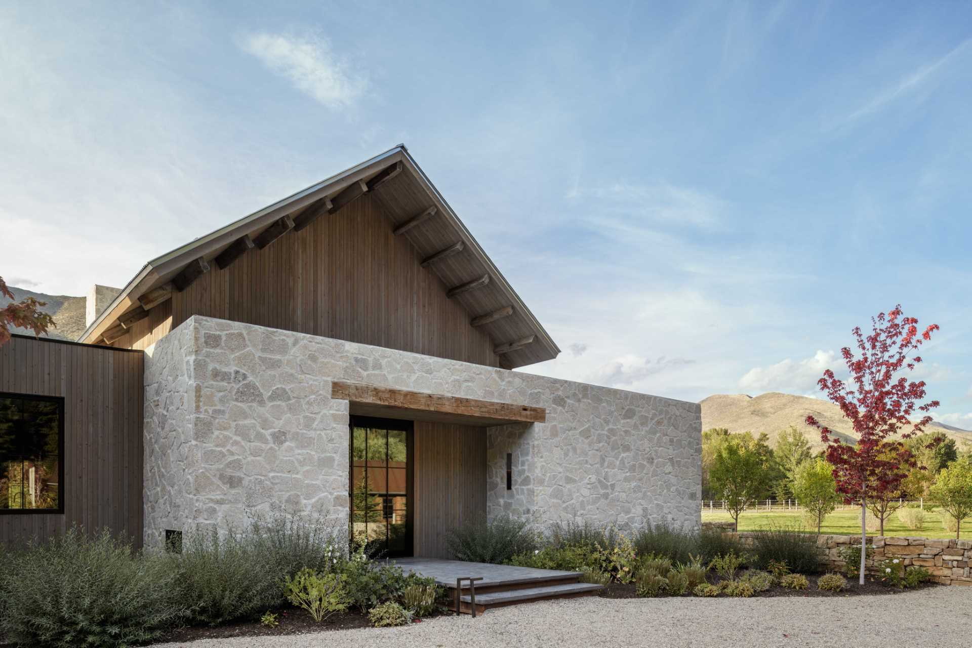 A ranch house that seamlessly integrates rustic charm and contemporary elegance.