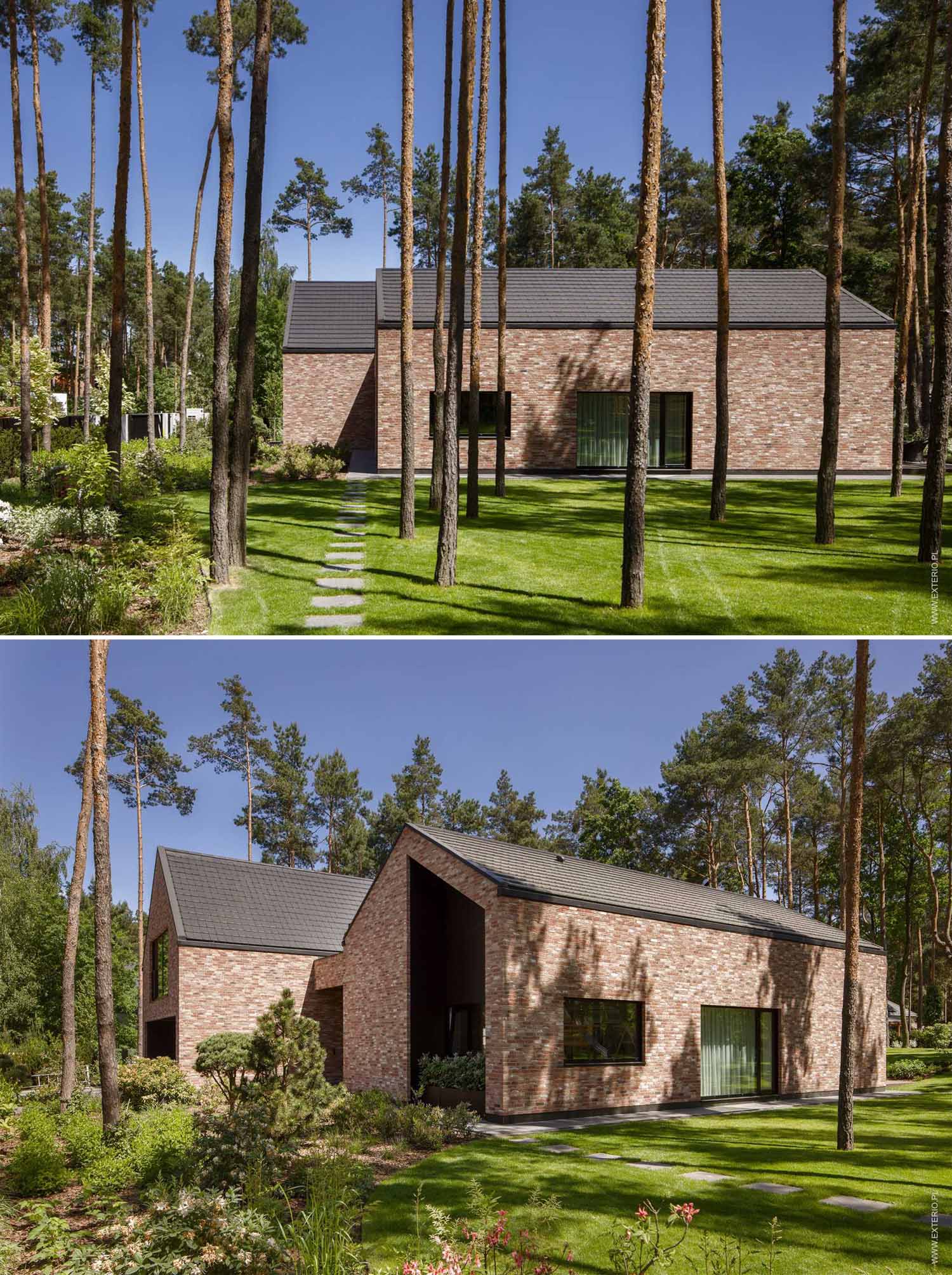 A modern home with a handmade rustic brick exterior, and dark ceramic roof tiles.