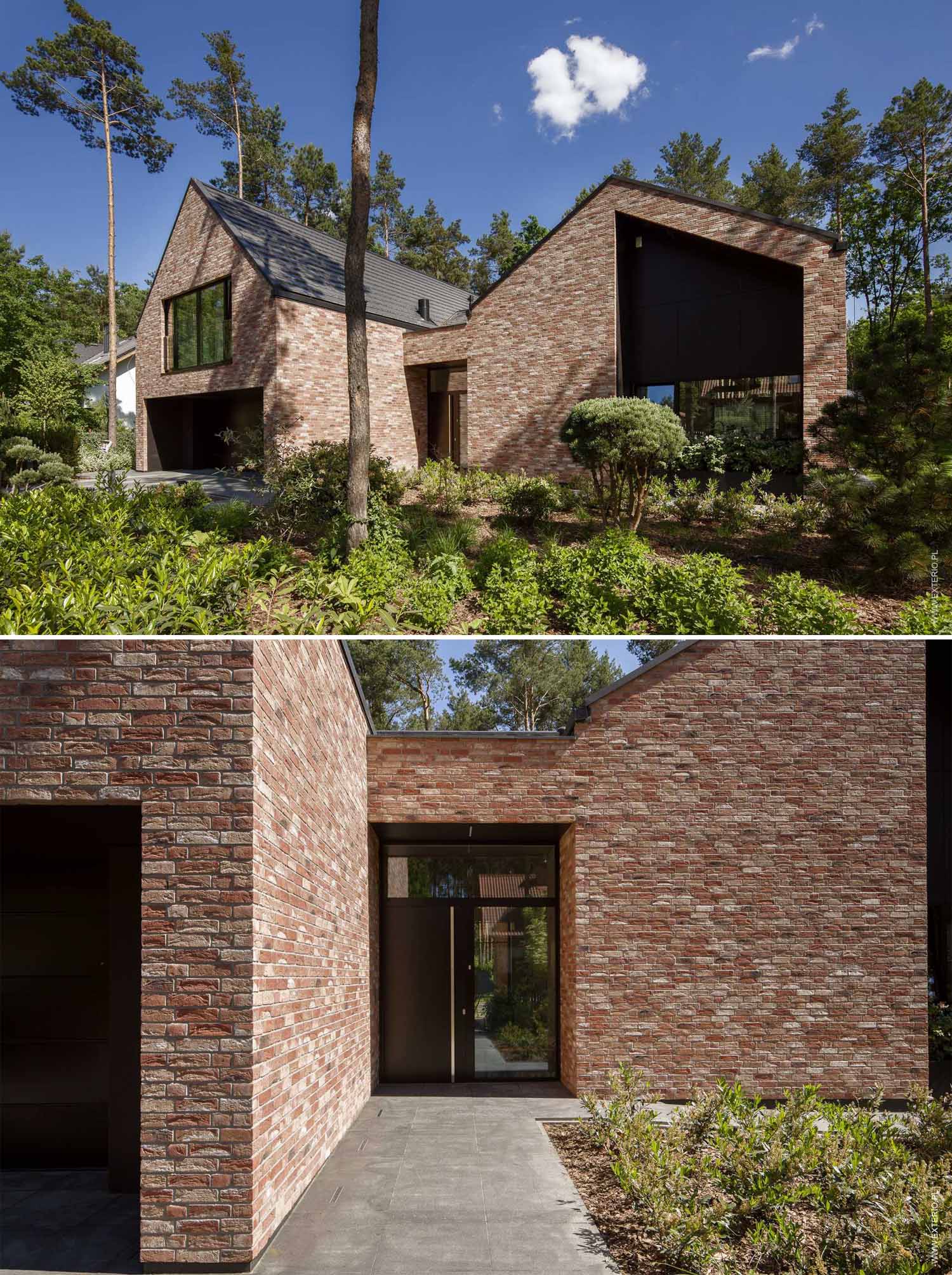 A modern home with a handmade rustic brick exterior, and dark ceramic roof tiles.