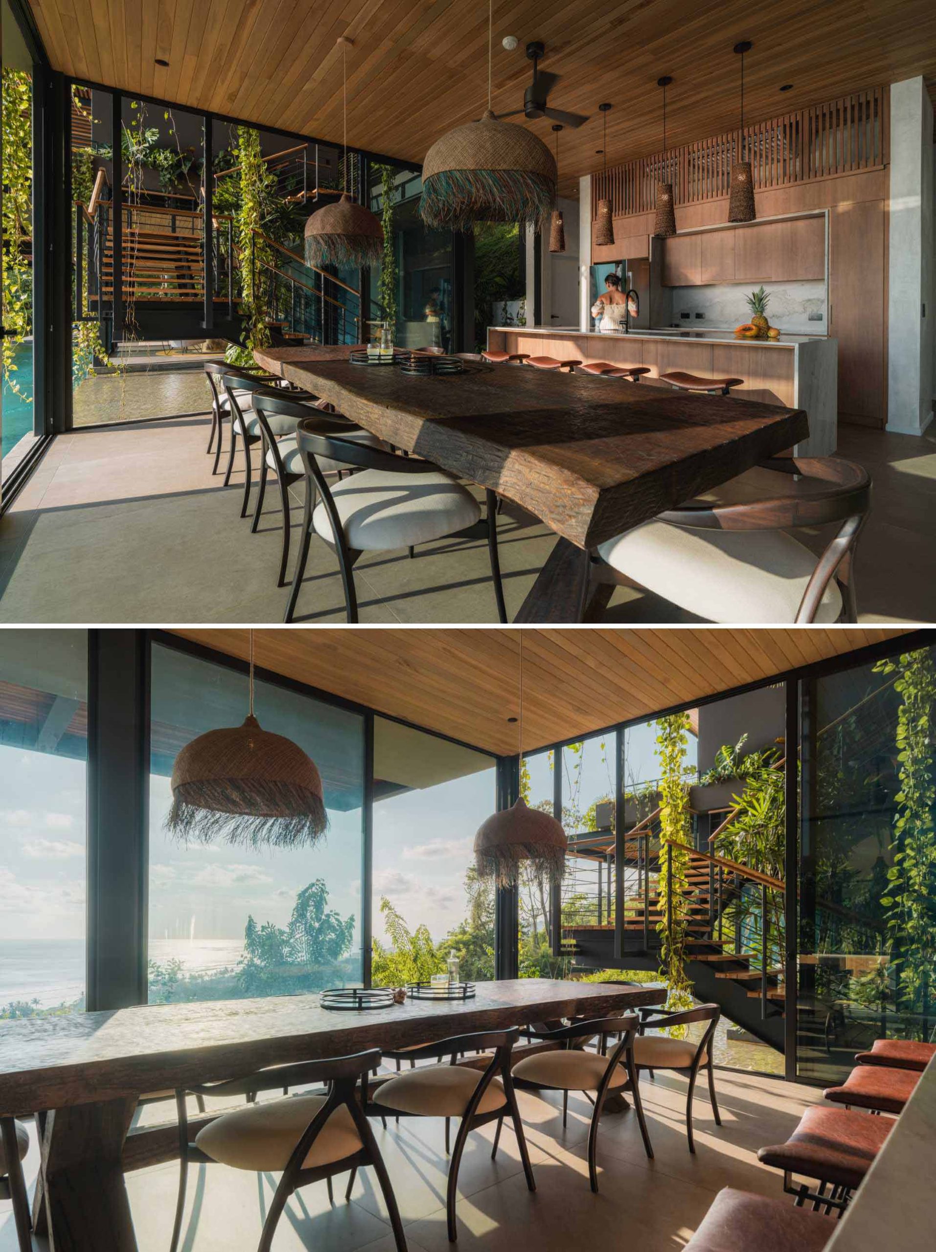 A modern open-plan dining area opens to the swimming pool and atrium with stairs.