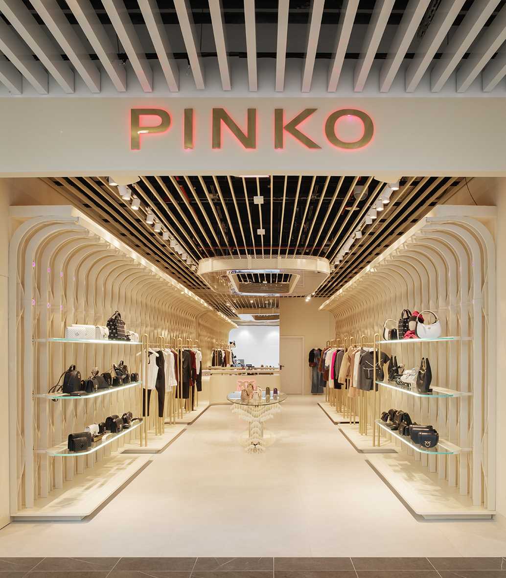 A modern retail store with 3D-printed design elements that line the walls.