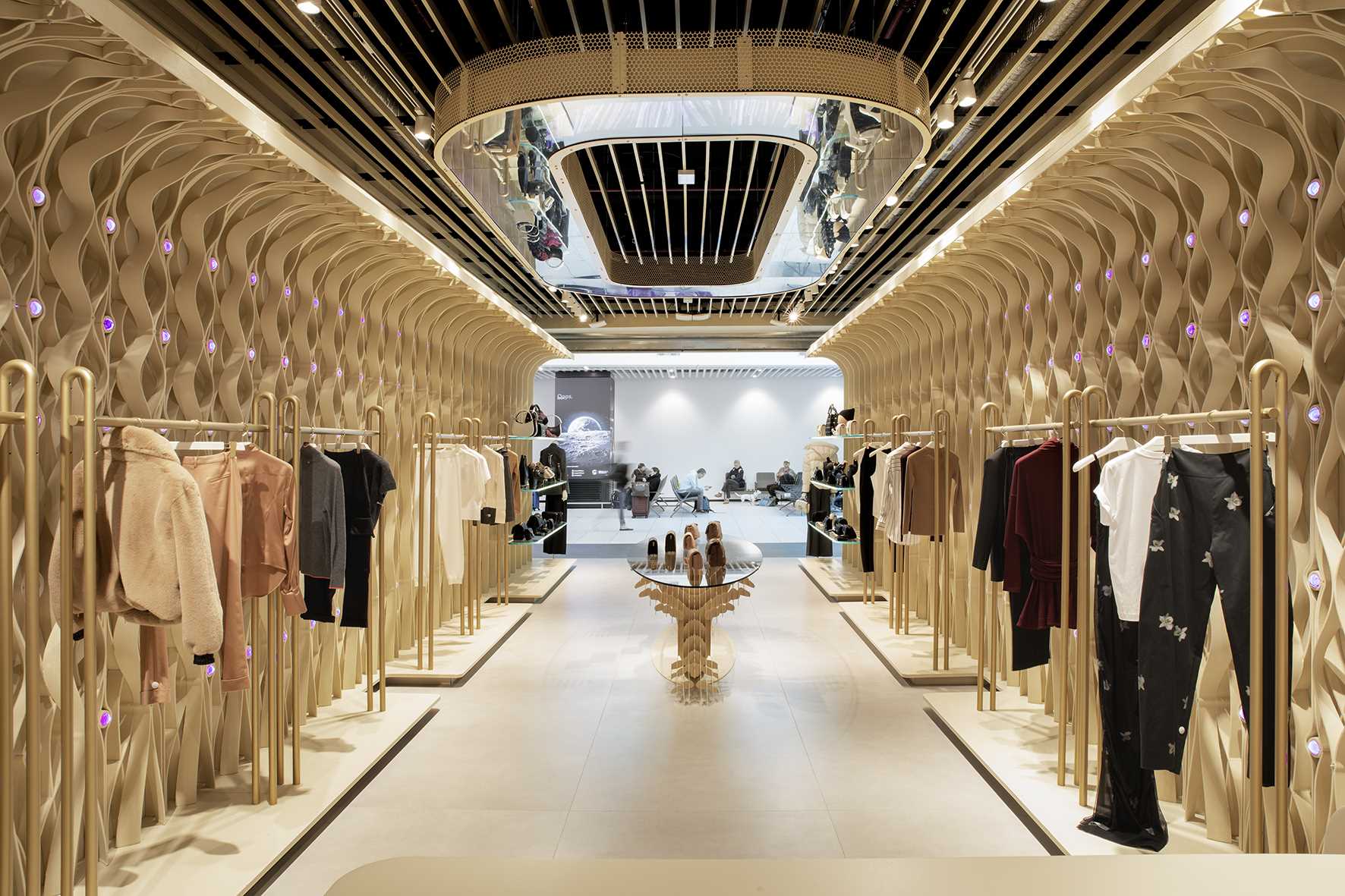 A modern retail store with 3D-printed design elements that line the walls.