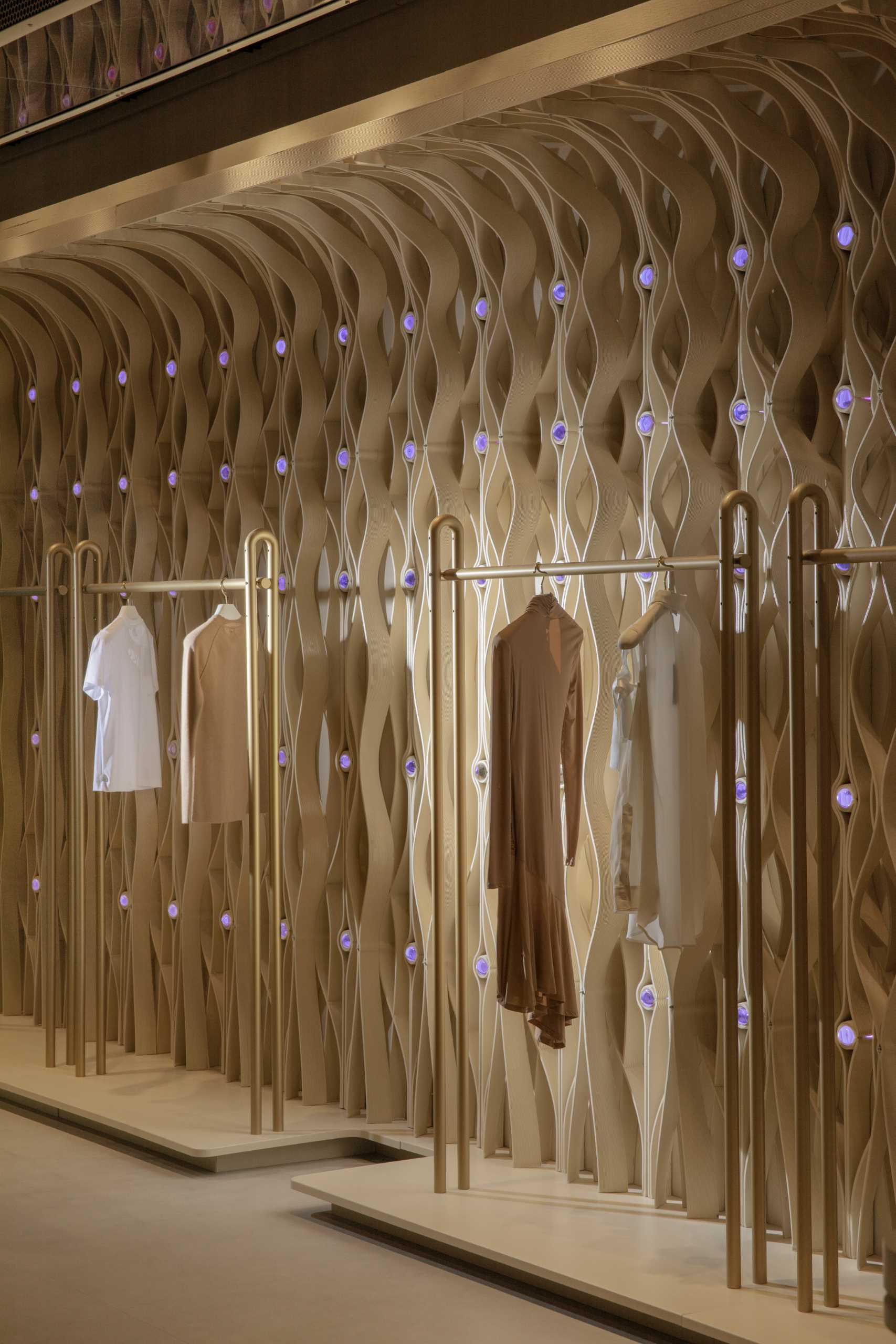 A modern retail store with 3D-printed design elements that line the walls.