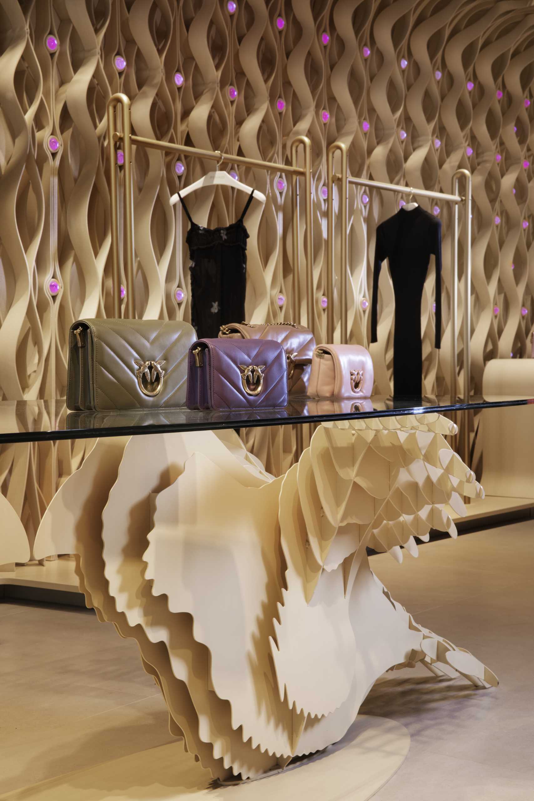 A modern retail store with 3D-printed design elements that line the walls.