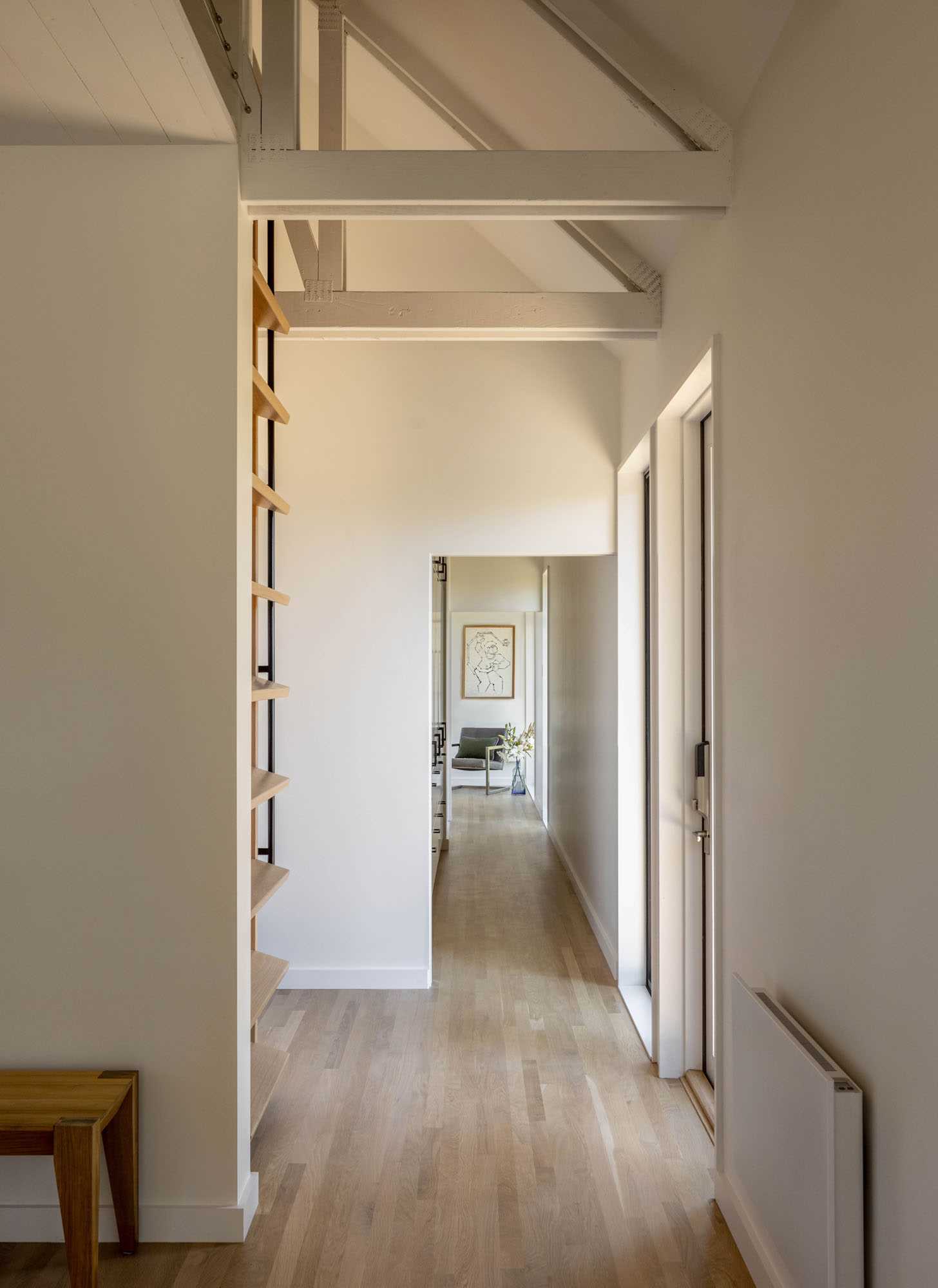 Stairs tucked away in the hallway can be pulled out to provide access to the loft.