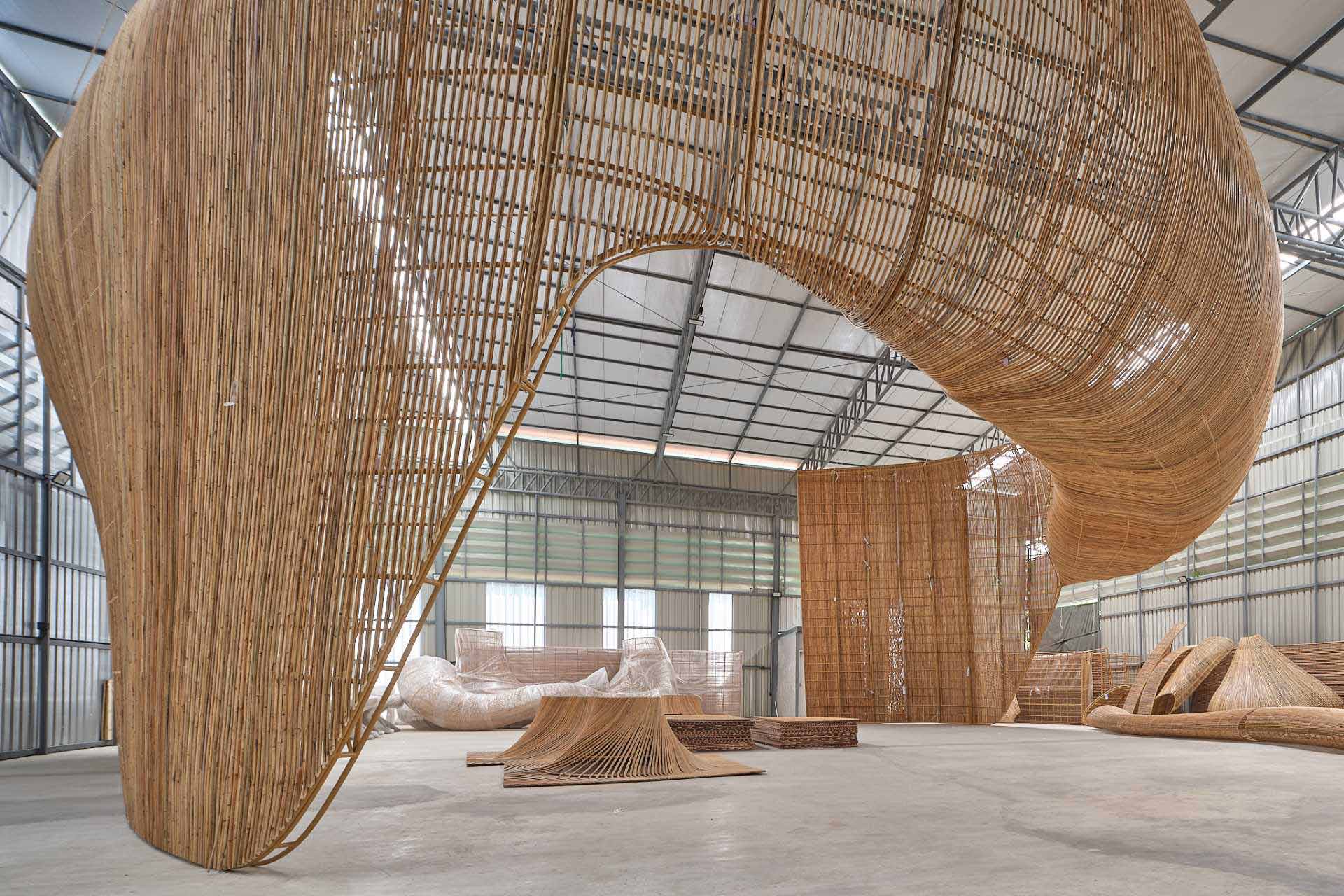 Making Of Photos - The interior of Bengaluru International Airport features over 5 miles (9km) of rattan that makes up pods and sculptures.