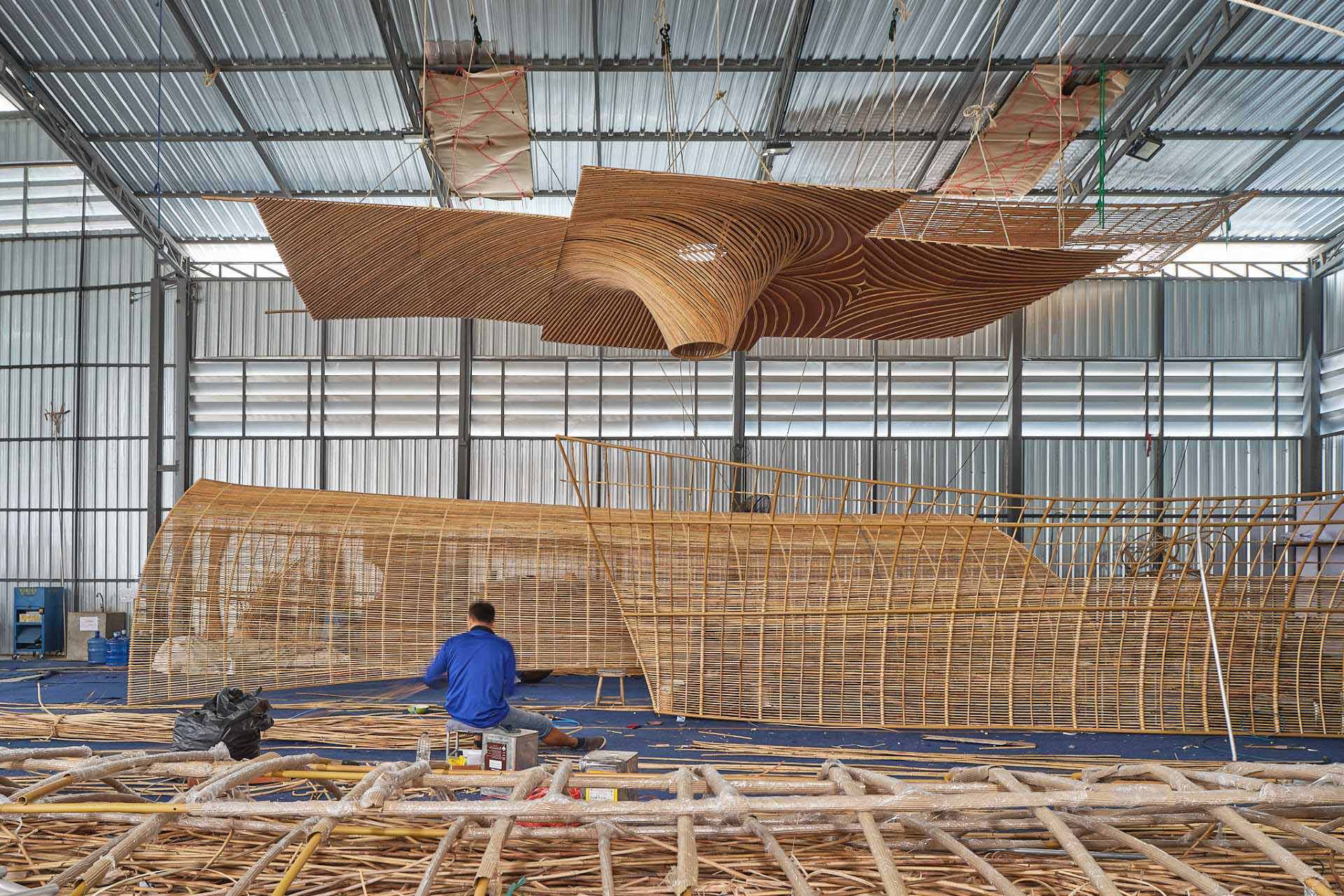 Making Of Photos - The interior of Bengaluru International Airport features over 5 miles (9km) of rattan that makes up pods and sculptures.