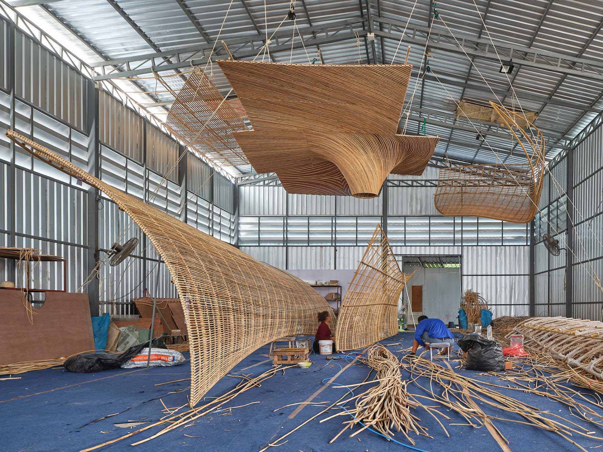 Making Of Photos - The interior of Bengaluru International Airport features over 5 miles (9km) of rattan that makes up pods and sculptures.