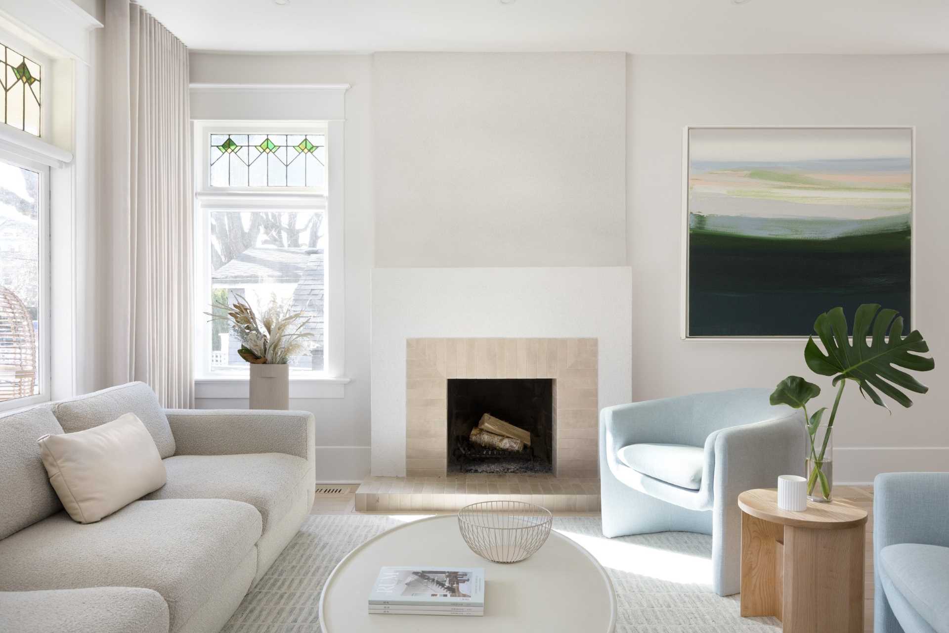 A modern coastal-inspired living room with a neutral and contemporary color palette.