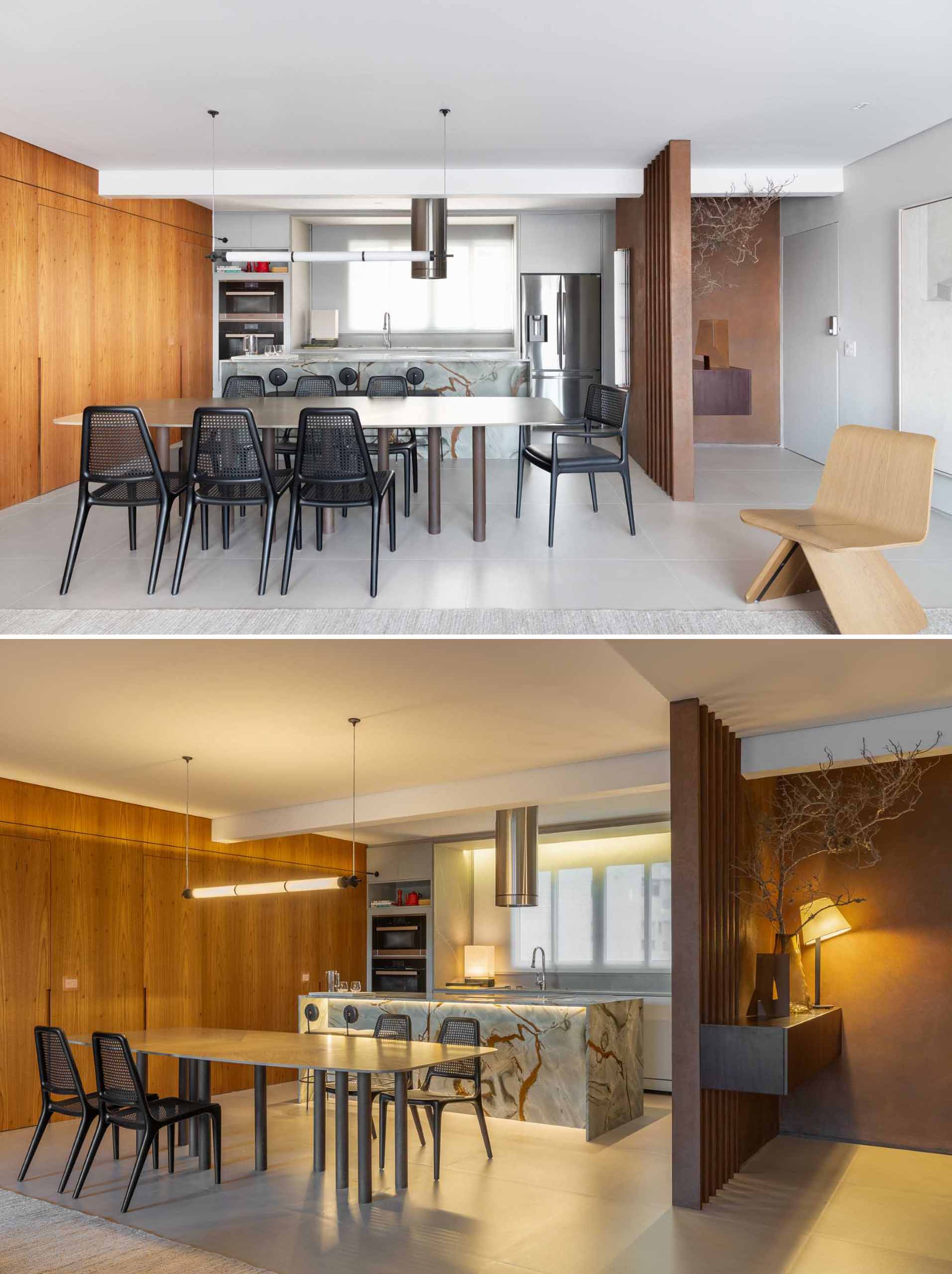 A modern kitchen and open plan dining area in an apartment.