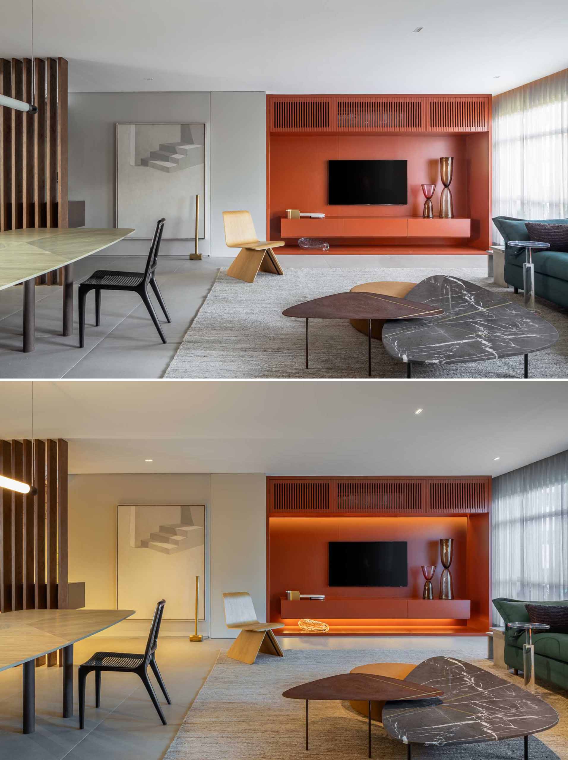 A colorful matte orange wall with hidden lighting that houses the TV and storage.