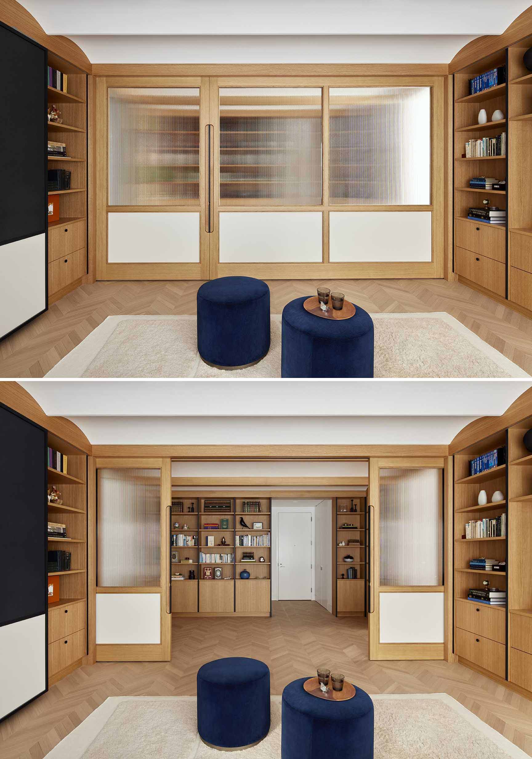 Wood and glass sliding doors allow the library to be open to the other areas of the apartment, or closed off for more privacy when being used as a guest room.