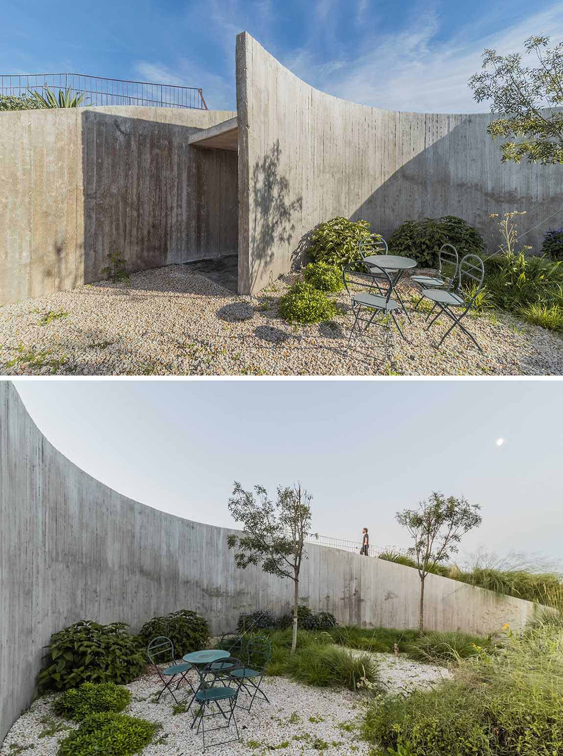 A curving contemporary home with a green roof, whose design was inspired by geometry and its surroundings.