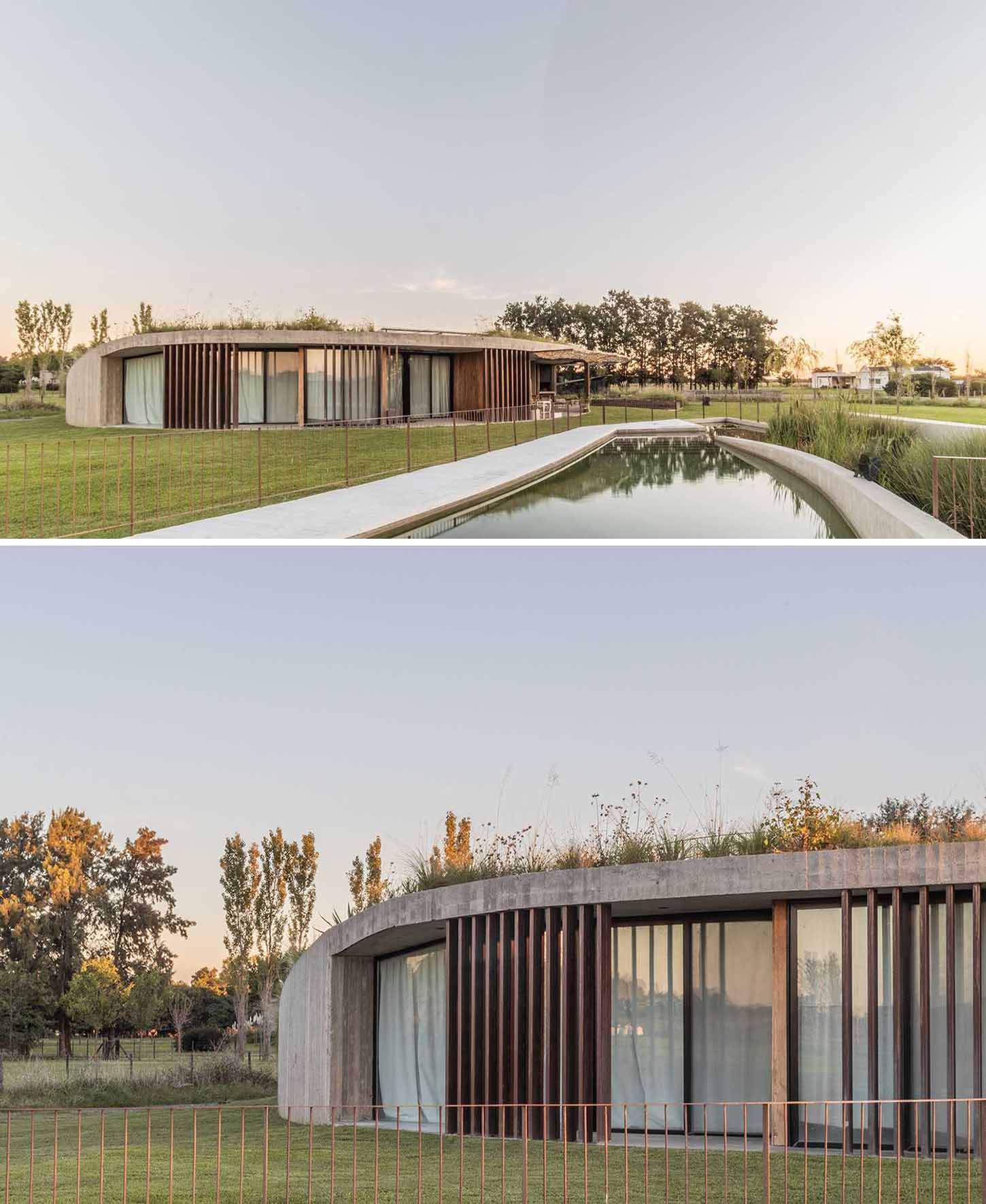 A curving contemporary home with a green roof, whose design was inspired by geometry and its surroundings.