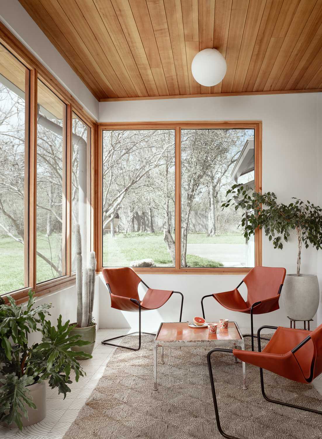 A screened in porch adds extra living room space for home owners that like to entertain.