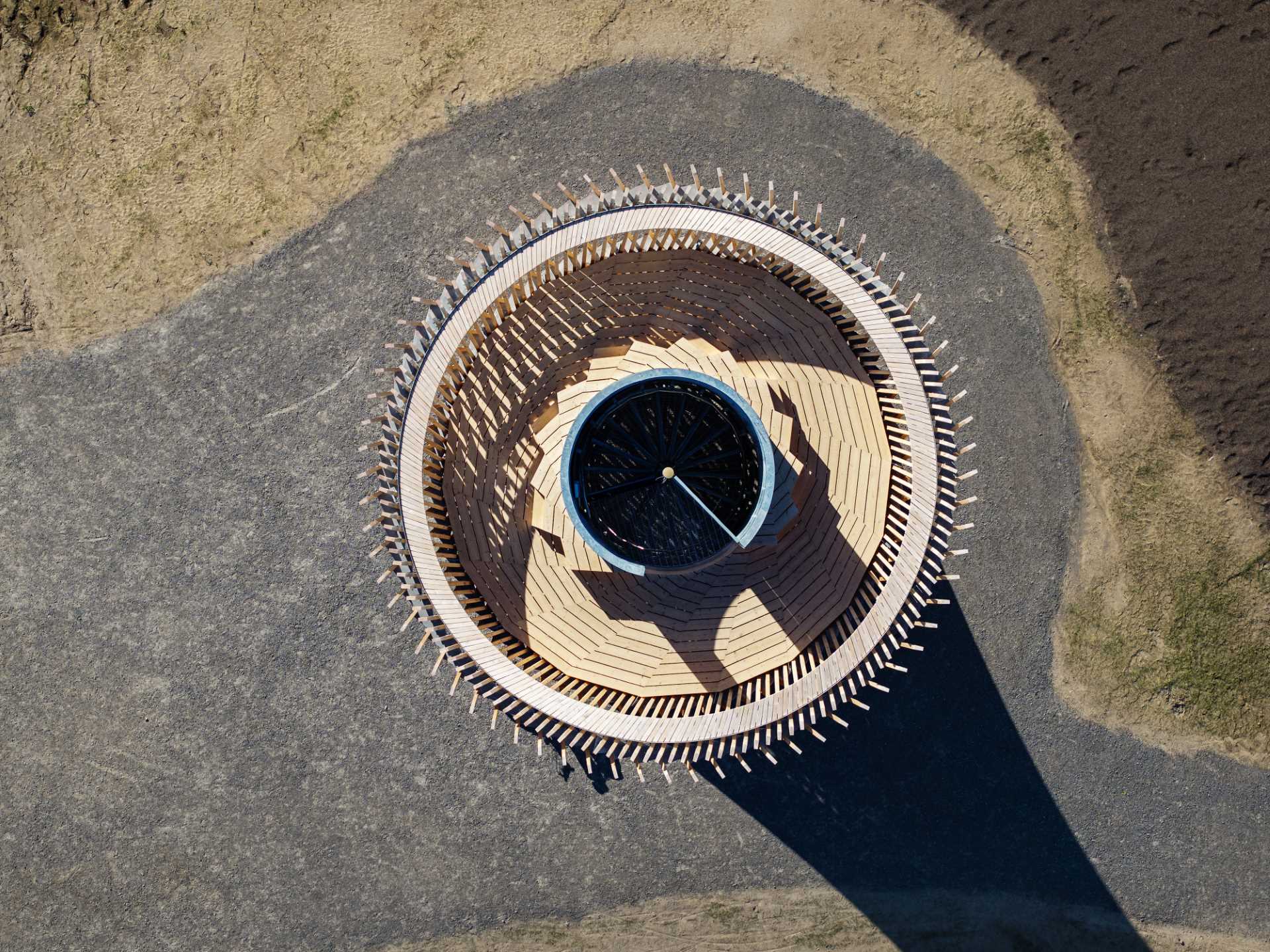 An observation tower in Sweden that looks like twisted wood.