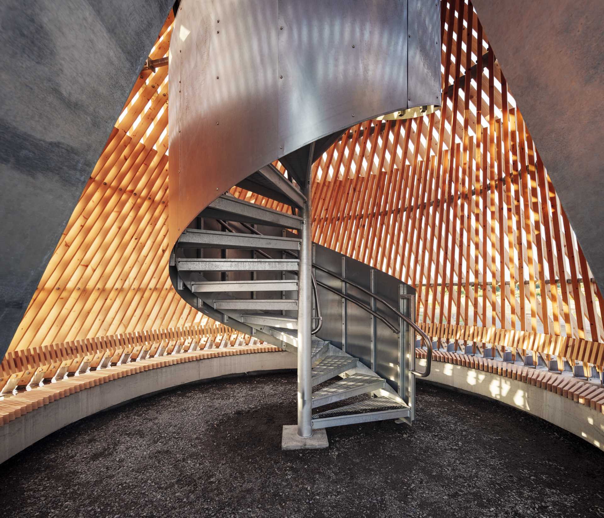 An observation tower in Sweden that looks like twisted wood.