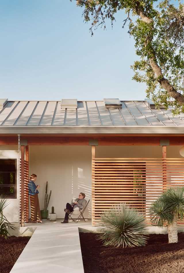 A renovated home with a small front porch.