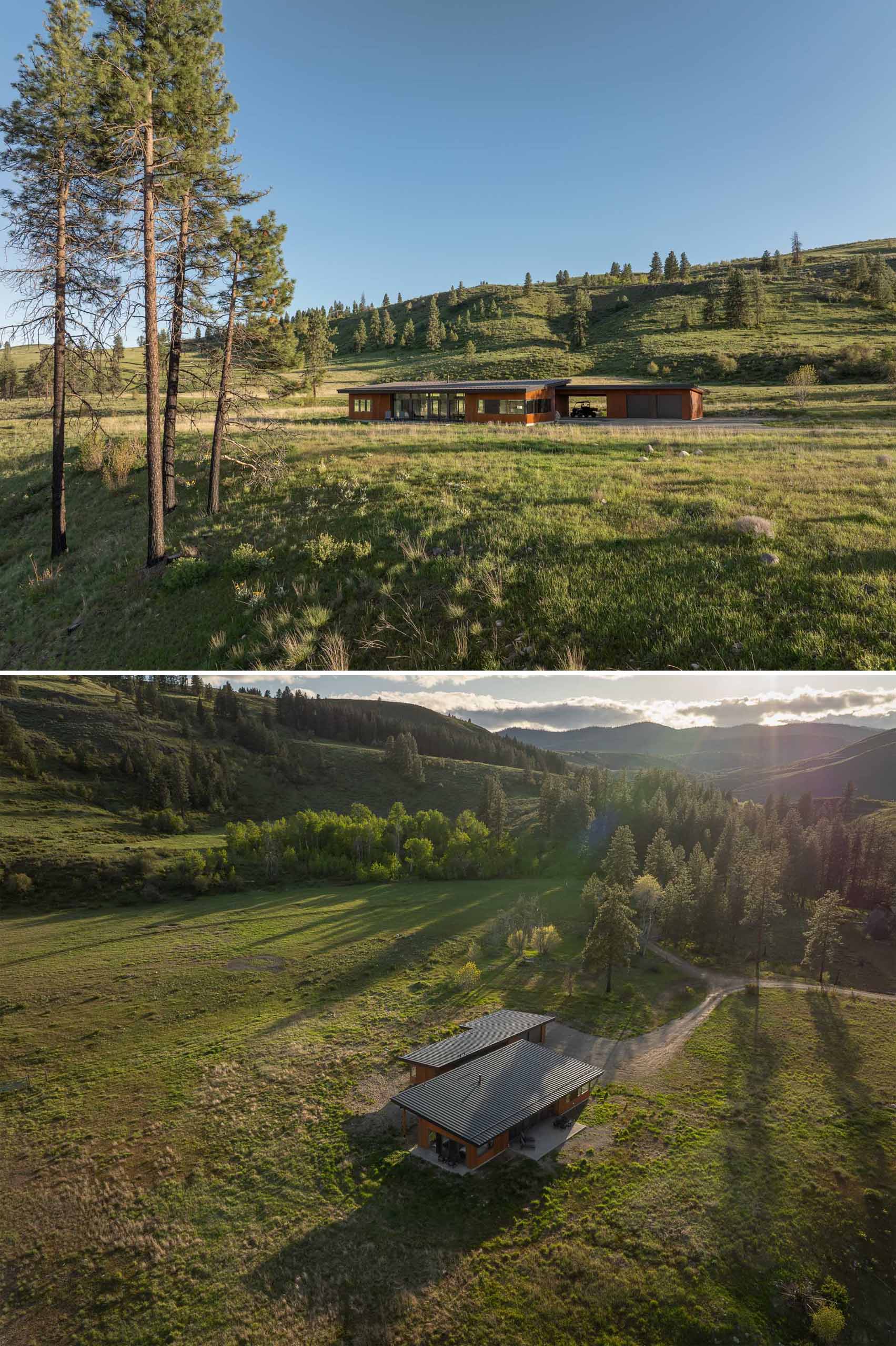 A contemporary home on a ranch clad with weathered corrugated metal siding.