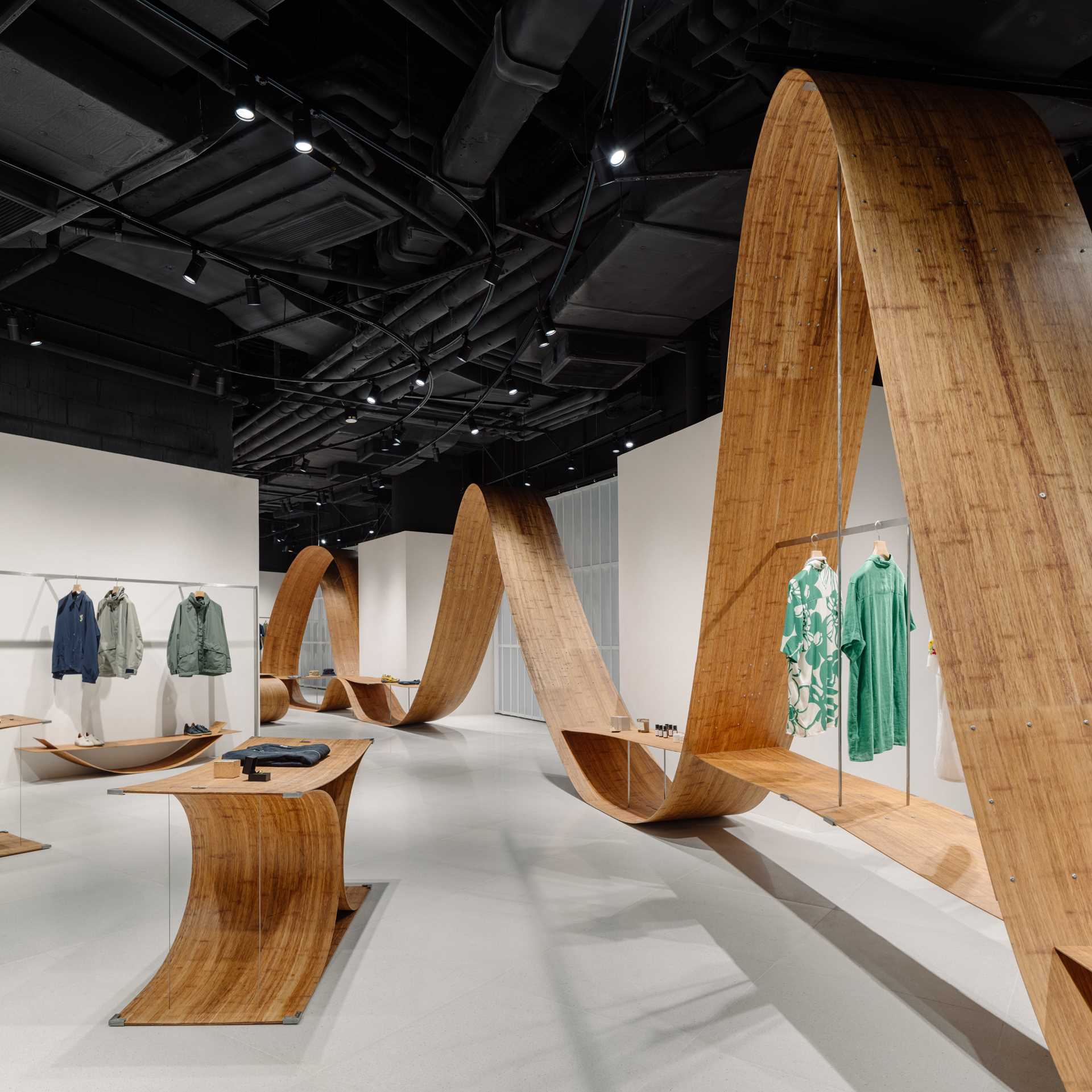 A pop-up shop and exhibition space includes sculptures and furniture made from bamboo.