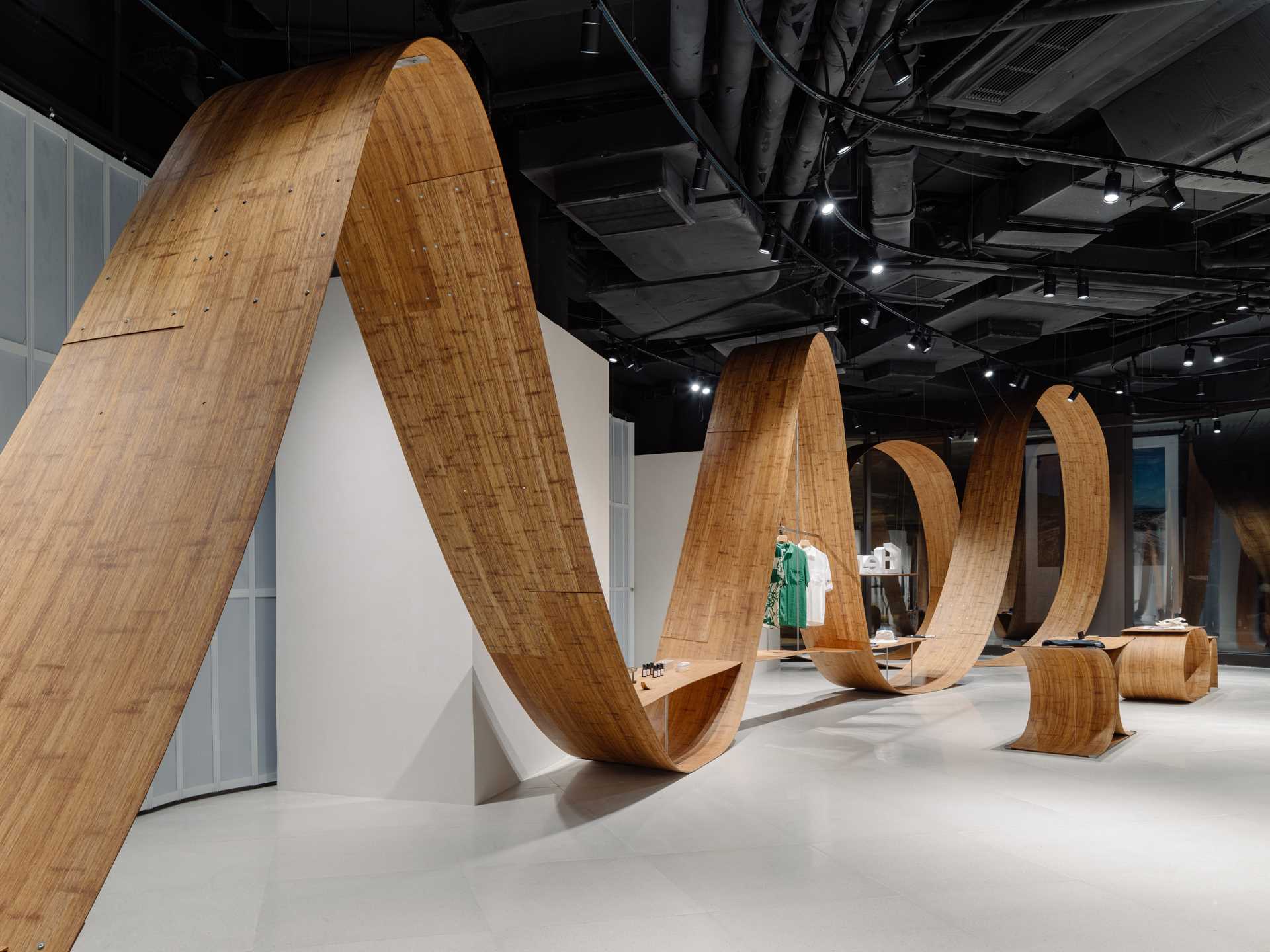 A pop-up shop and exhibition space includes sculptures and furniture made from bamboo.