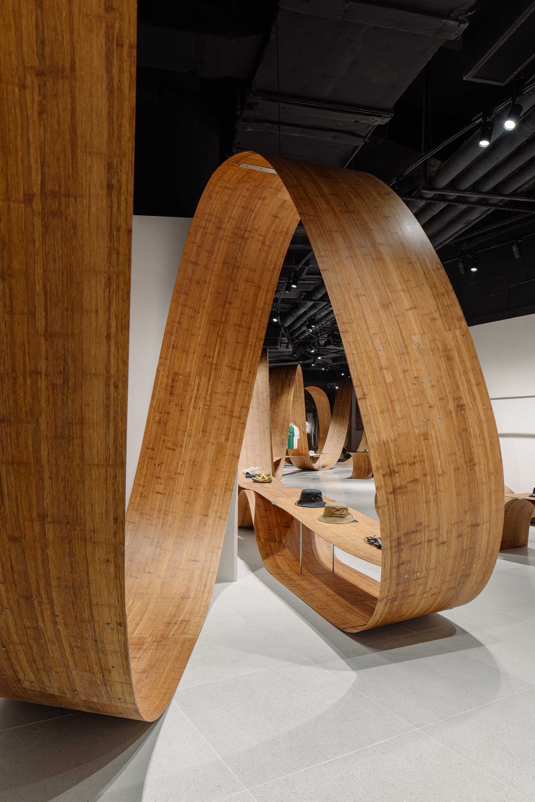 A pop-up shop and exhibition space includes sculptures and furniture made from bamboo.