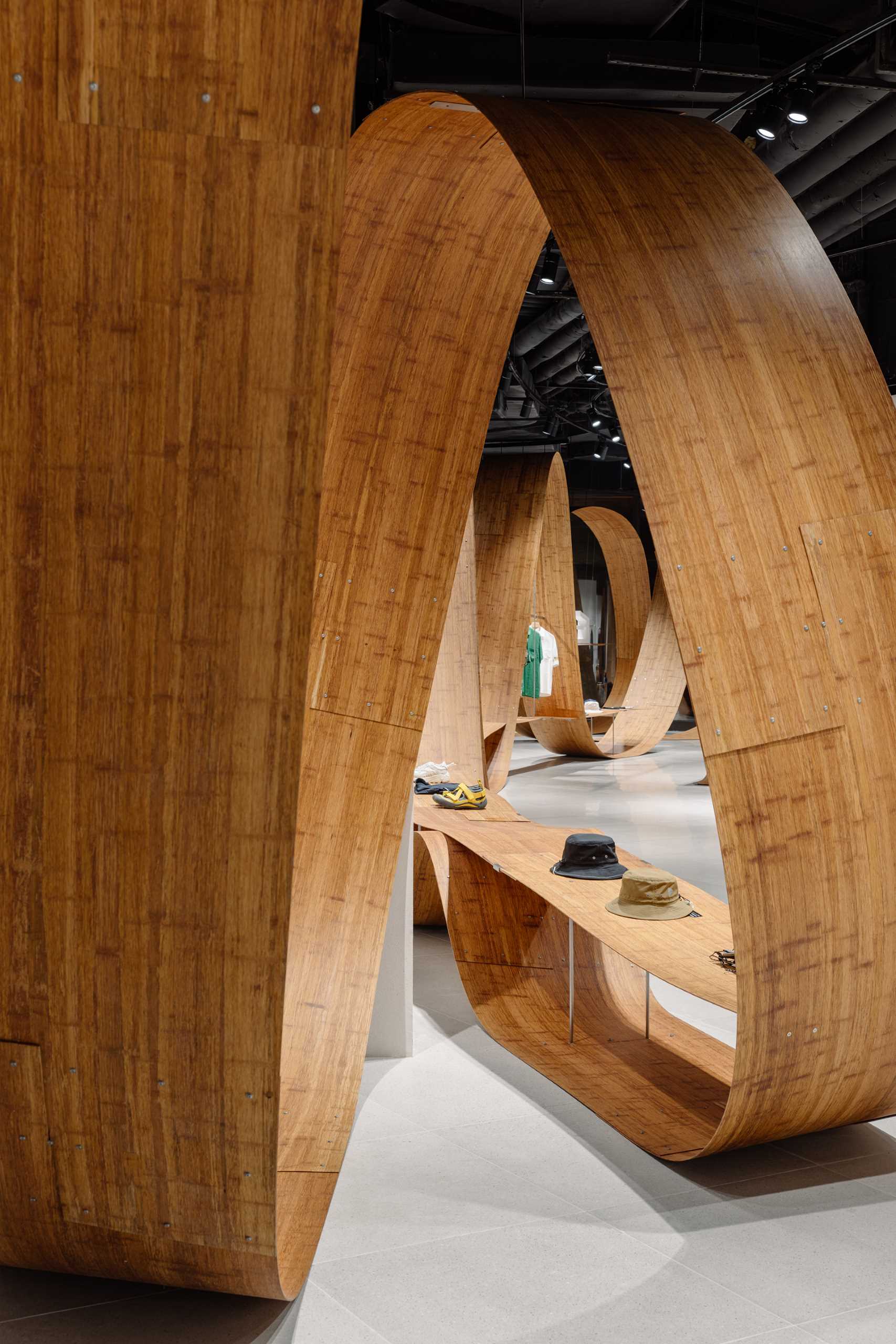 A pop-up shop and exhibition space includes sculptures and furniture made from bamboo.