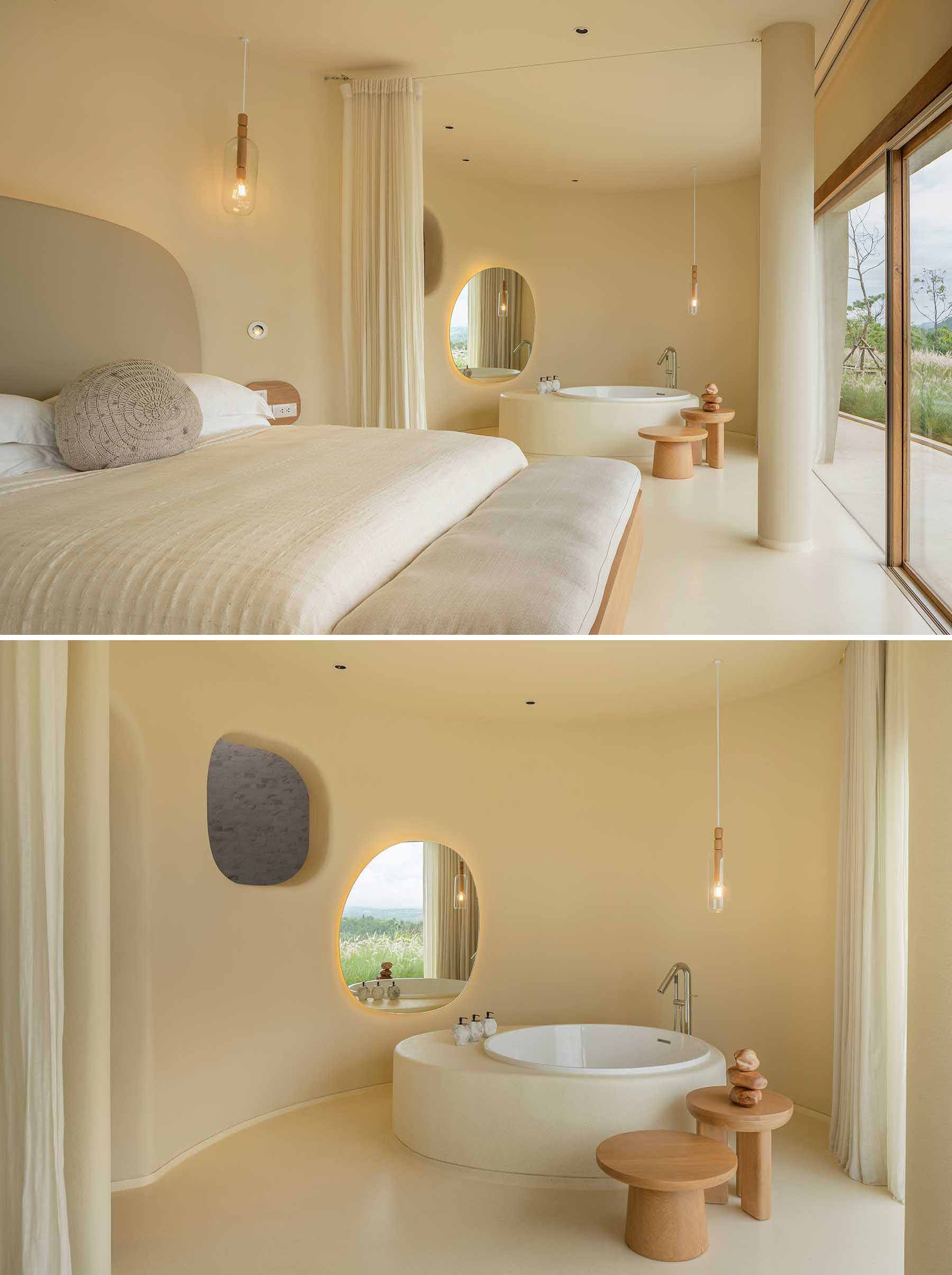 A modern hotel room with earth tones, natural materials, and a built-in bathtub.