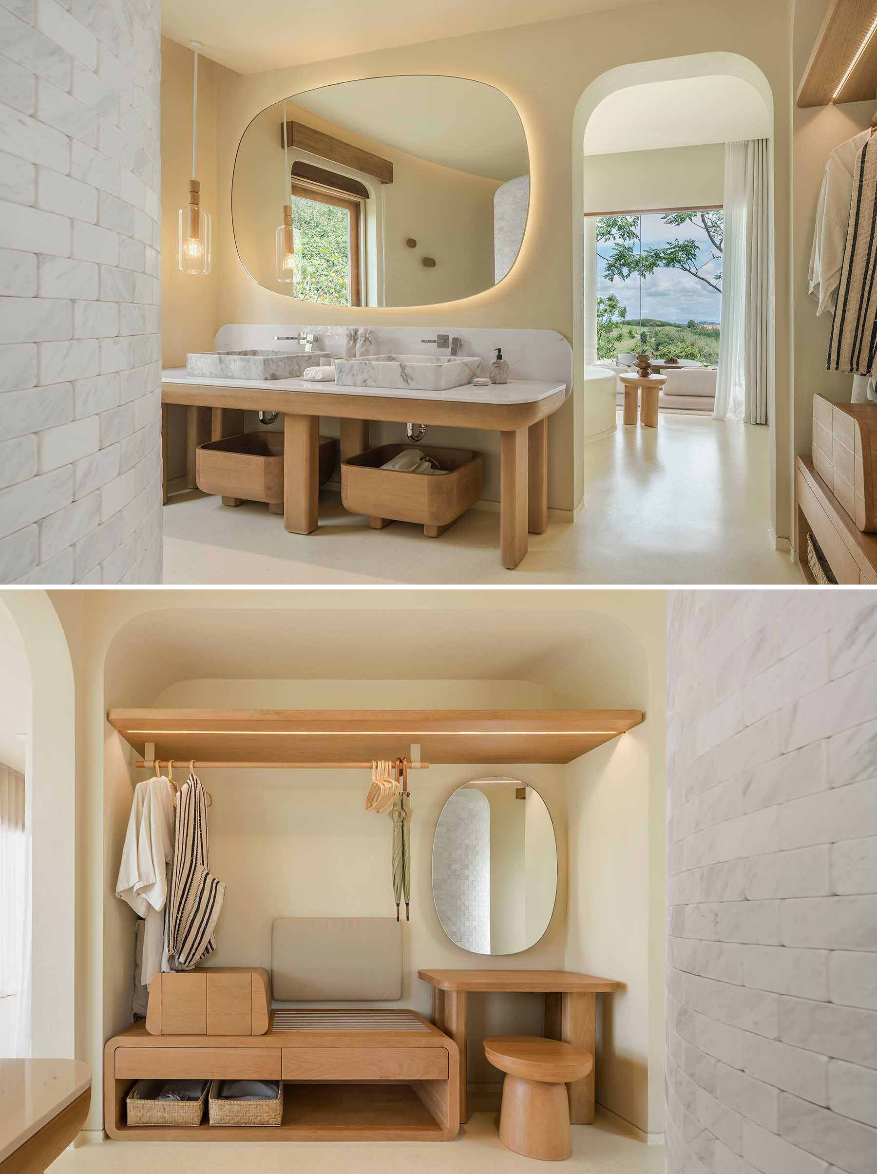 A modern bathroom with earth tones and a curved marble clad shower wall.