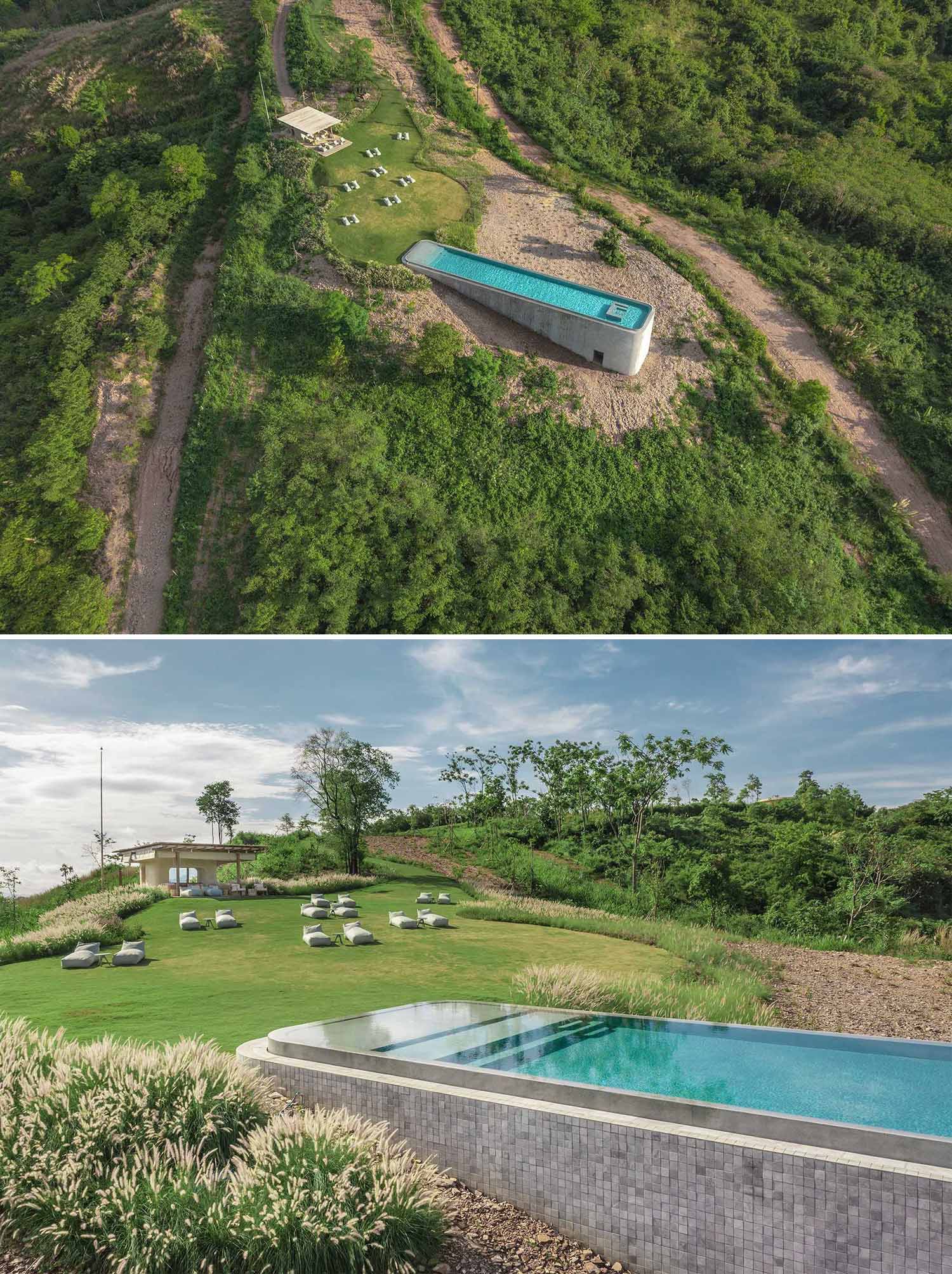 A long rectangular pool looks out to the landscape.