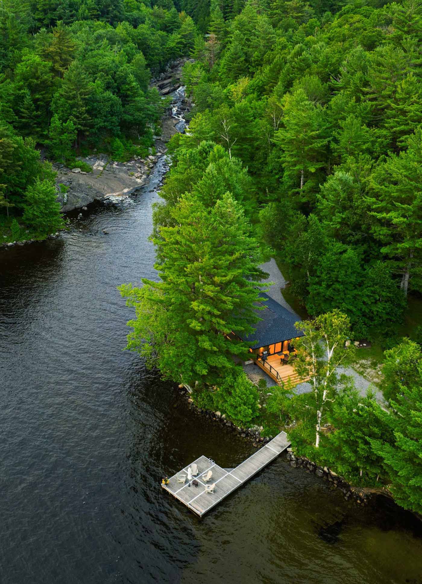 A small Canadian lakefront cabin with exposed Douglas Fir posts and beams.