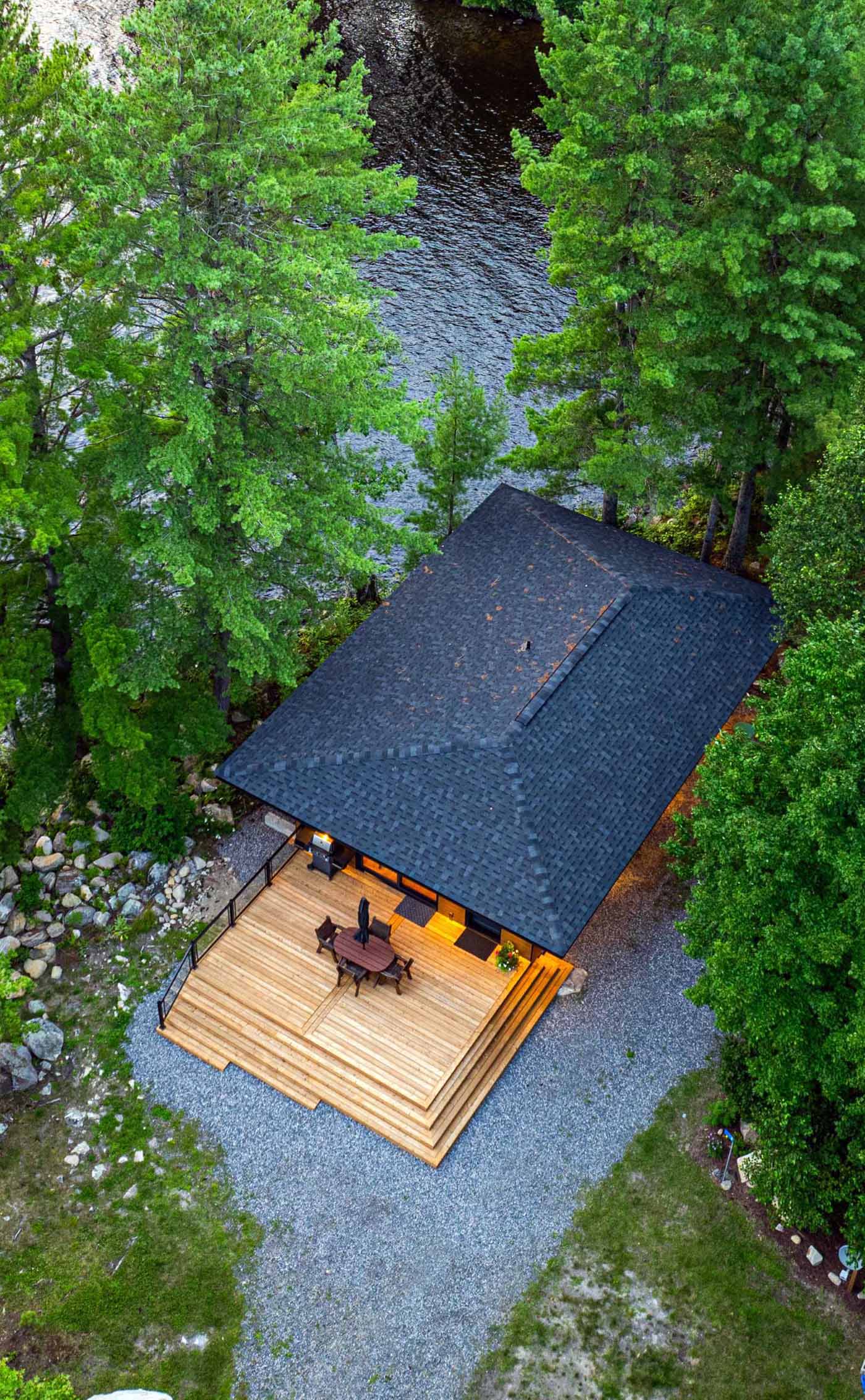 A small Canadian lakefront cabin with exposed Douglas Fir posts and beams.