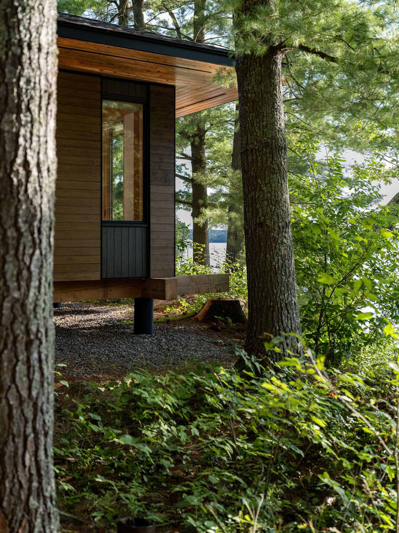 A small Canadian lakefront cabin with exposed Douglas Fir posts and beams.